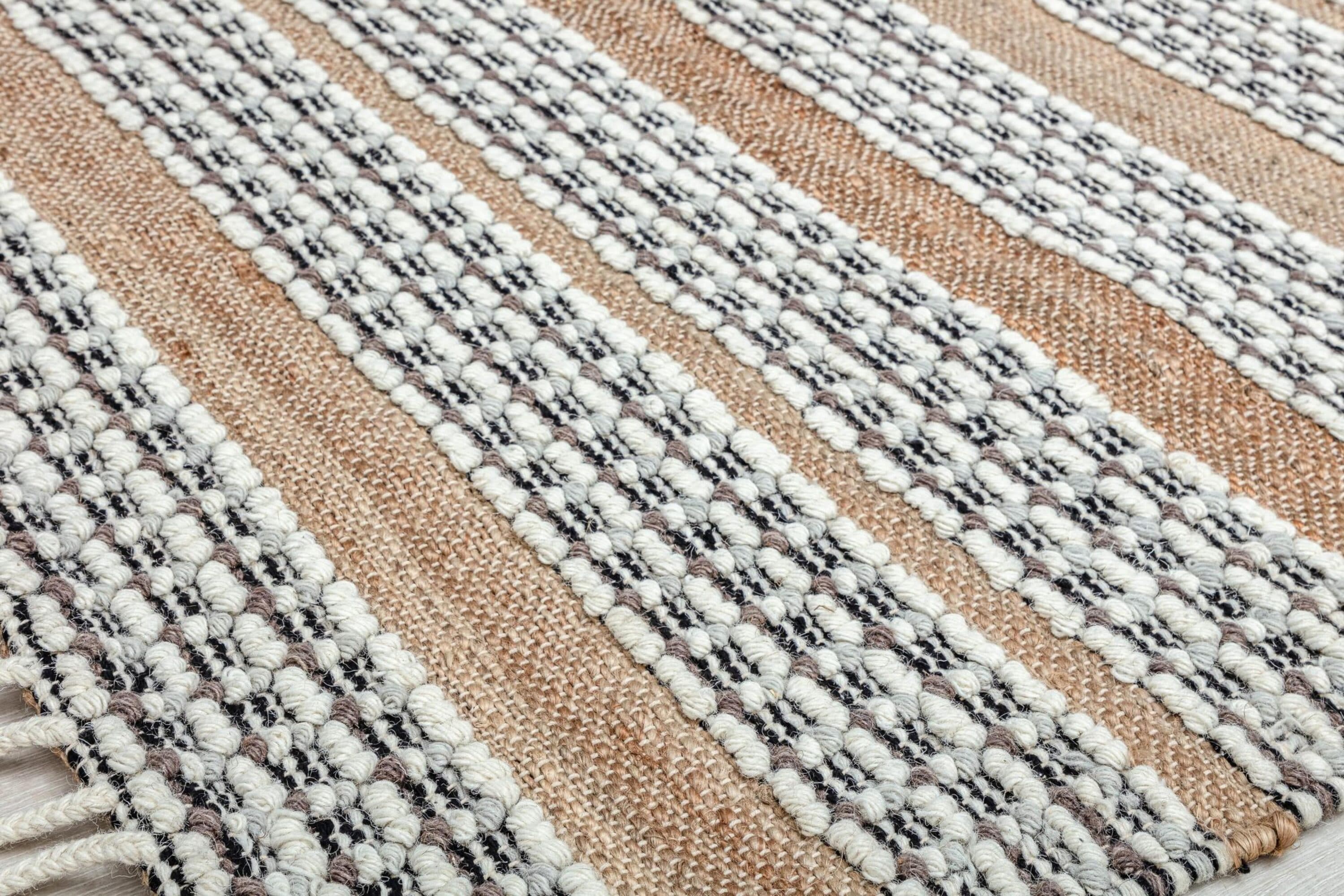 Handmade Natural Jute and Wool Striped Area Rug with Tassels