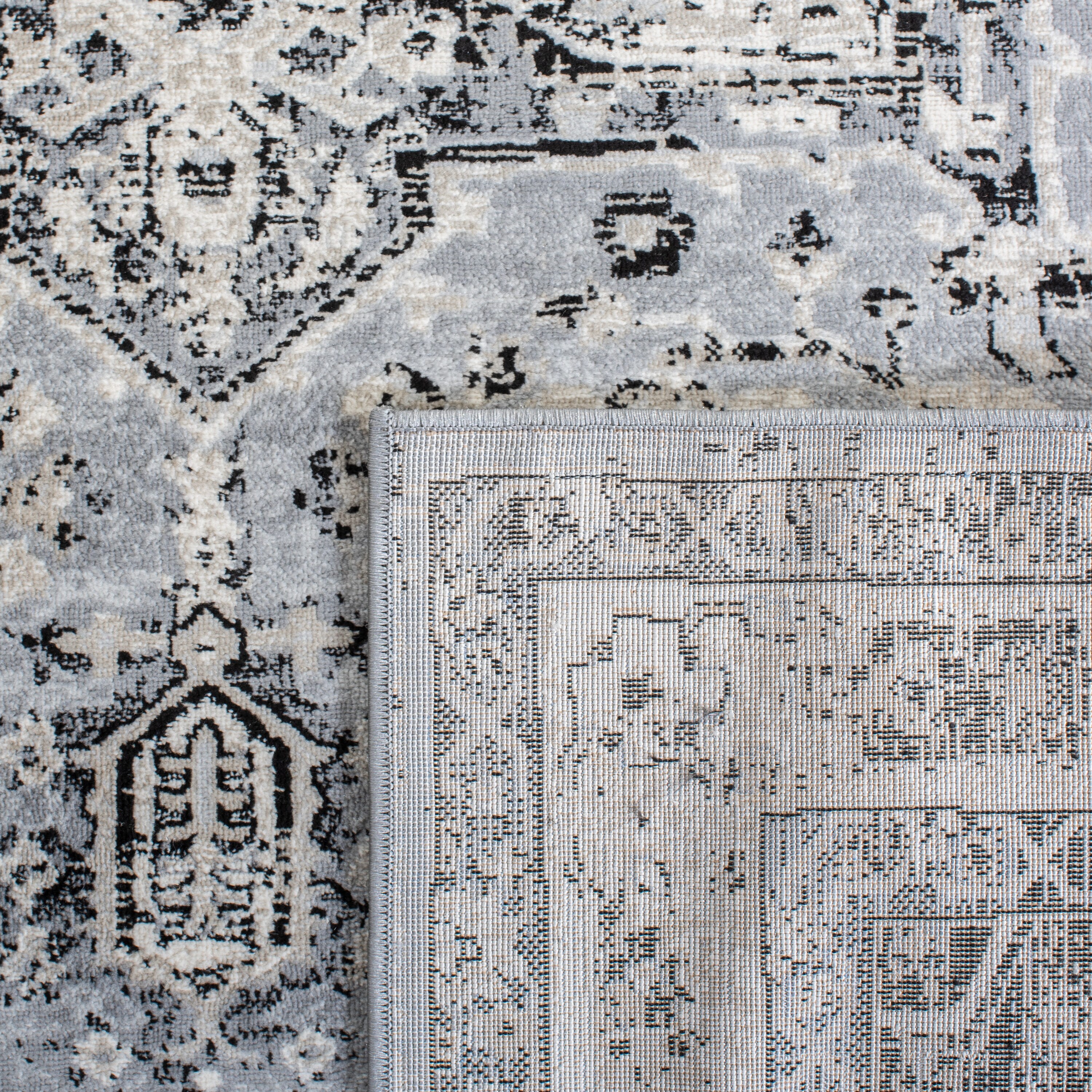 Elegant Heirloom 9' x 12' Grey and Black Synthetic Area Rug