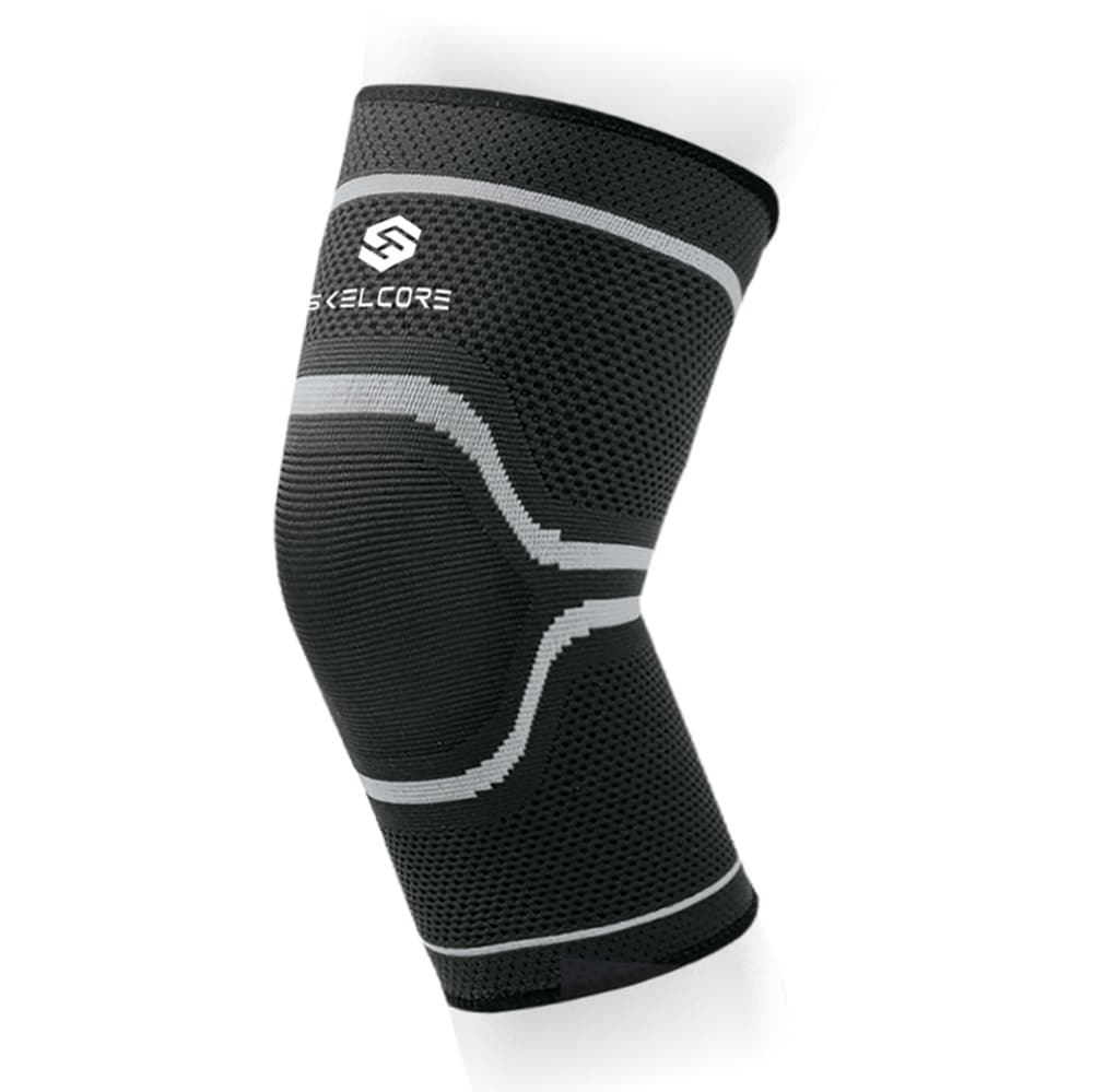 Genutrain Comfort - Compression knee brace with plastic stays for