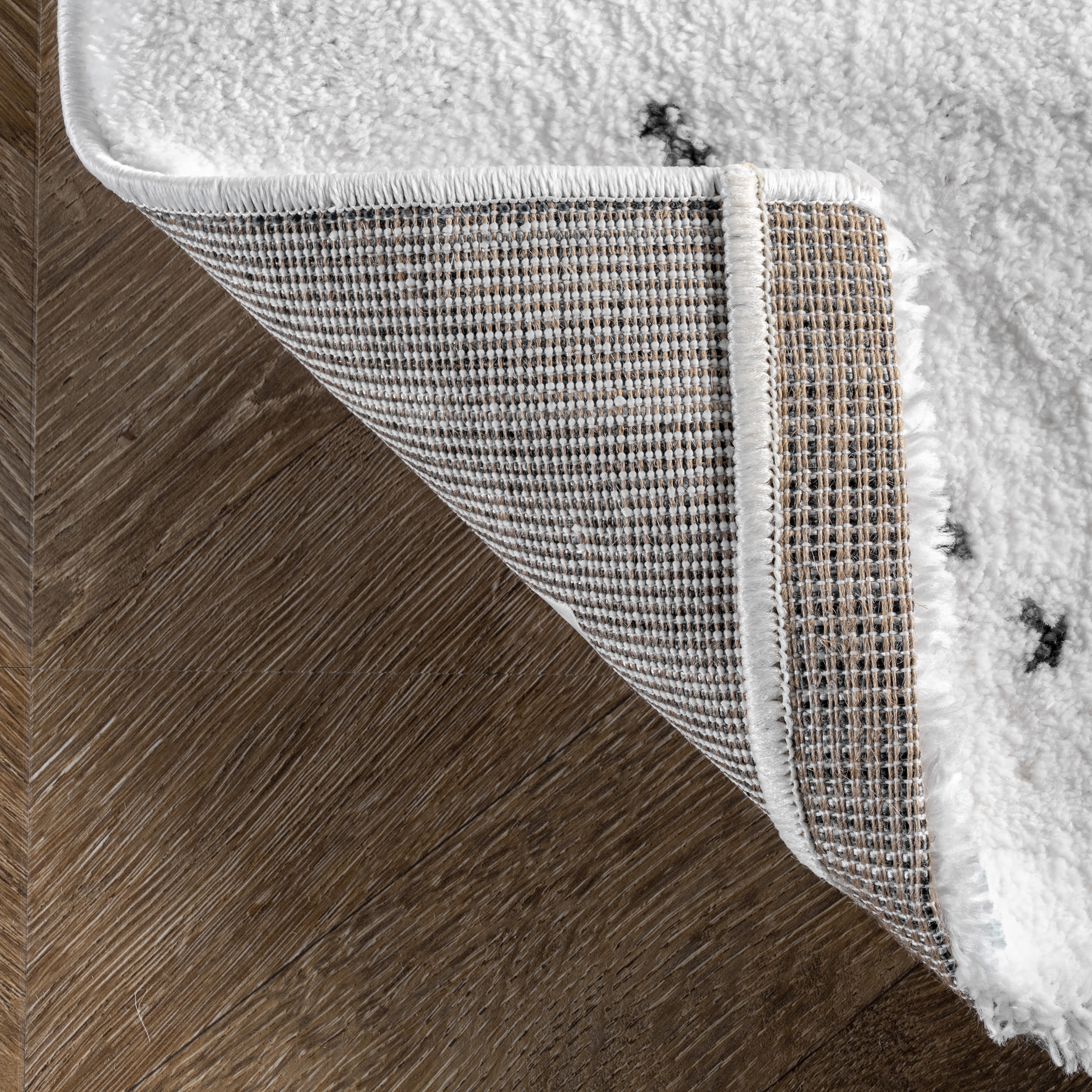 Handmade Black Geometric 4' x 6' Tufted Shag Rug