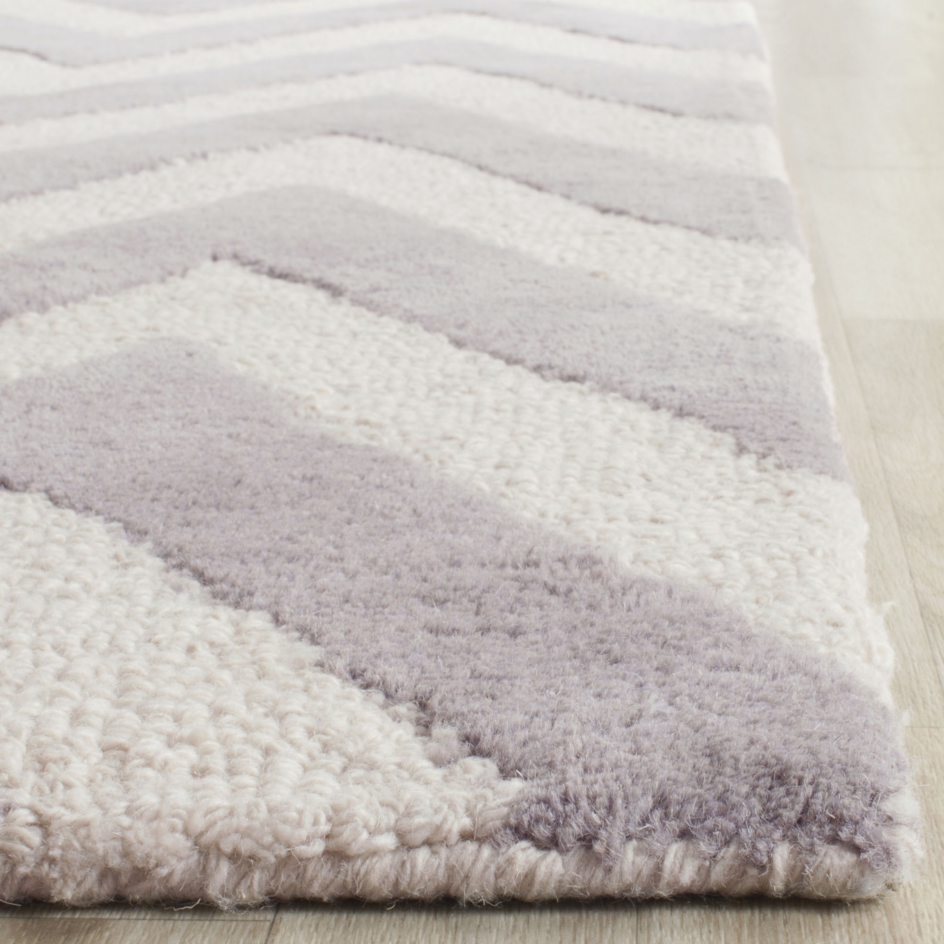 Handmade Silver and Ivory Tufted Wool Area Rug