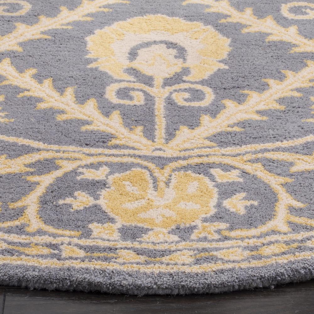 Handmade Blue and Gold Round Wool Tufted Area Rug