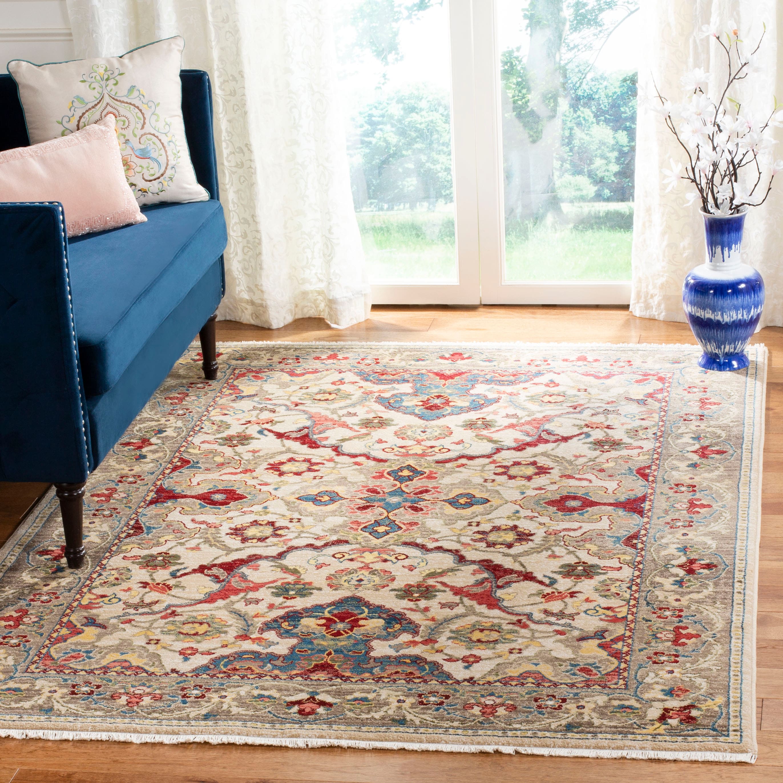 Kashan 5 x 7 (ft) Loomed Polypropylene Ivory/Taupe Rectangular Indoor Mid-Century Modern Professionally Clean Only Area rug