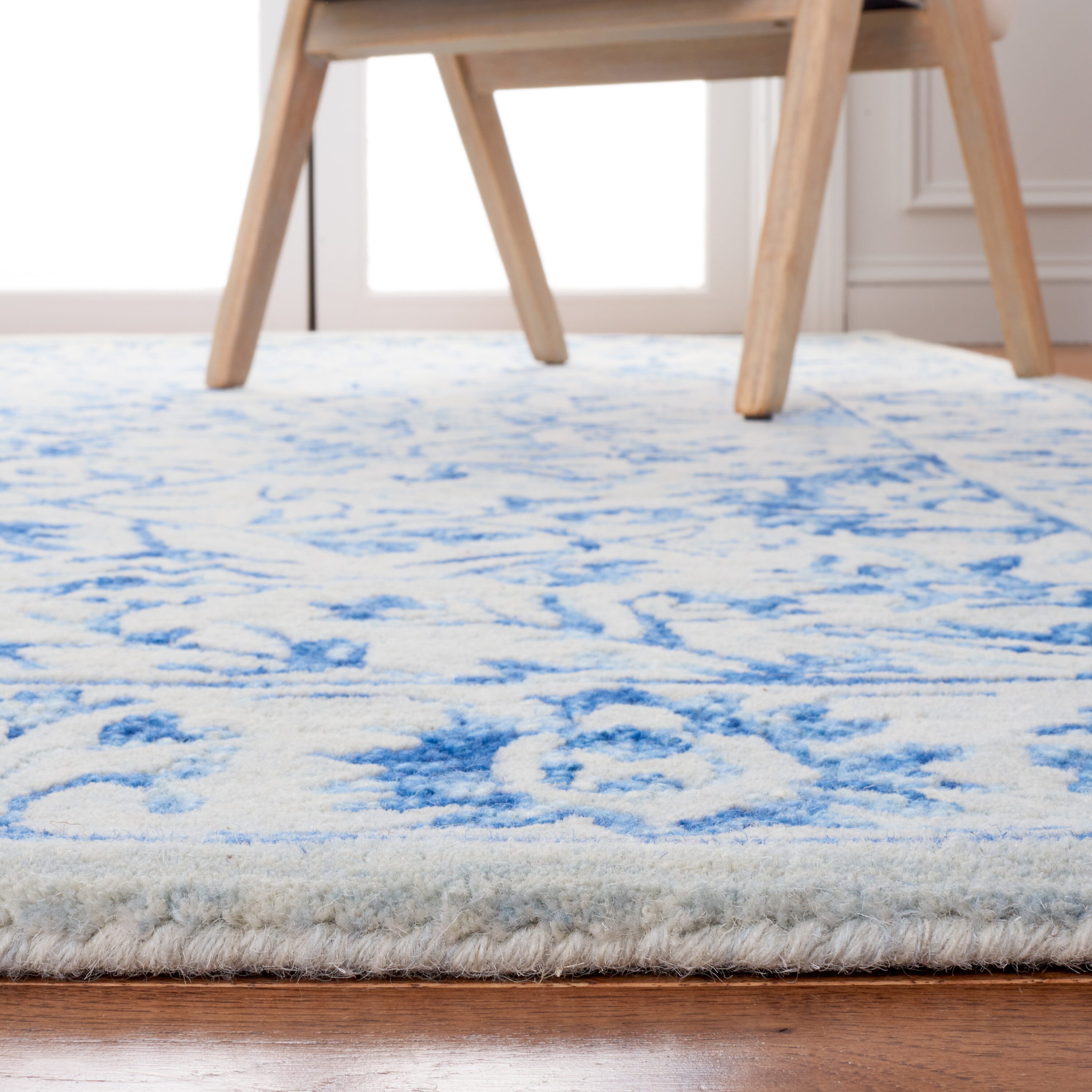 Hand-Tufted Blue and Beige Wool 4' x 6' Area Rug
