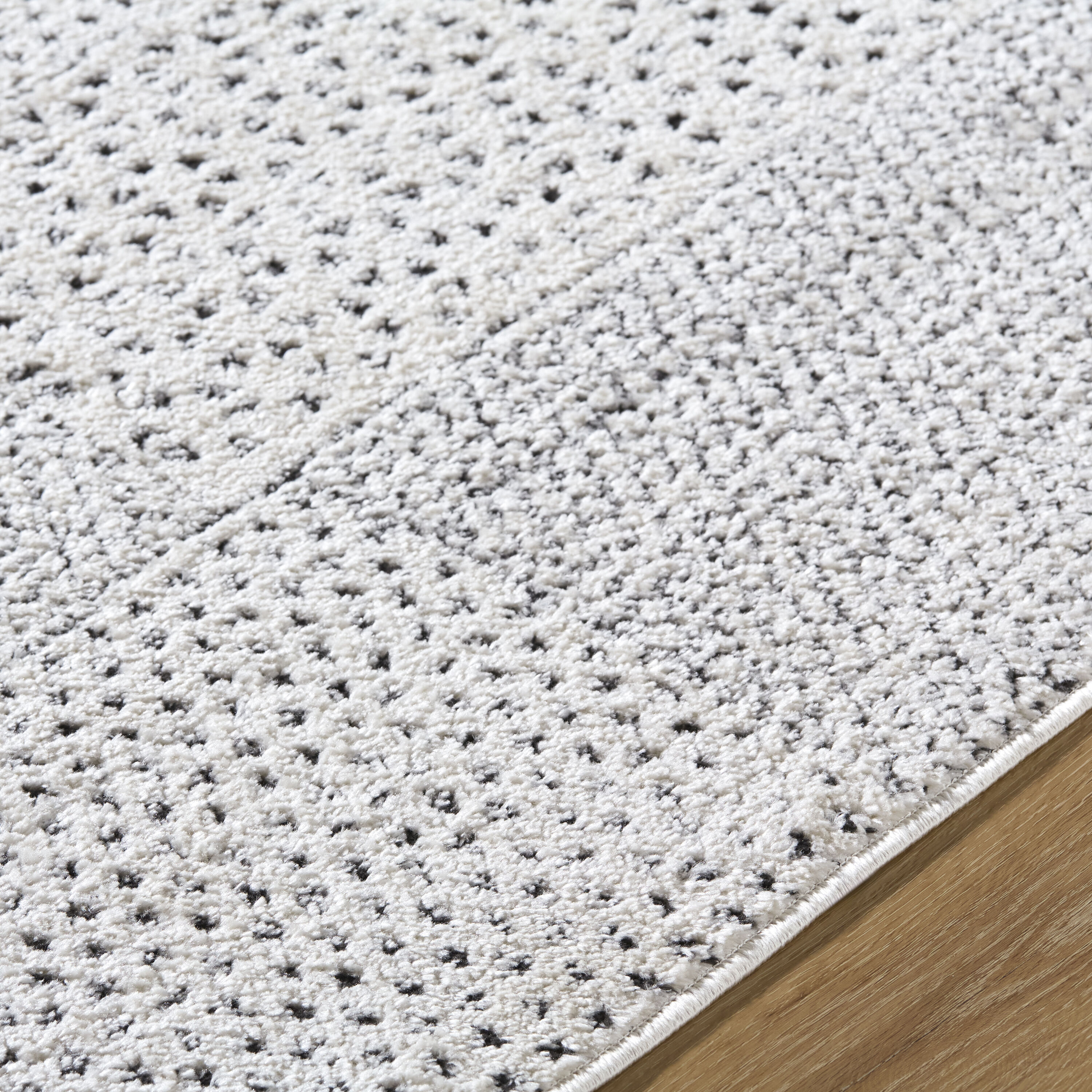Ivory and Black Geometric Polyester Runner Rug