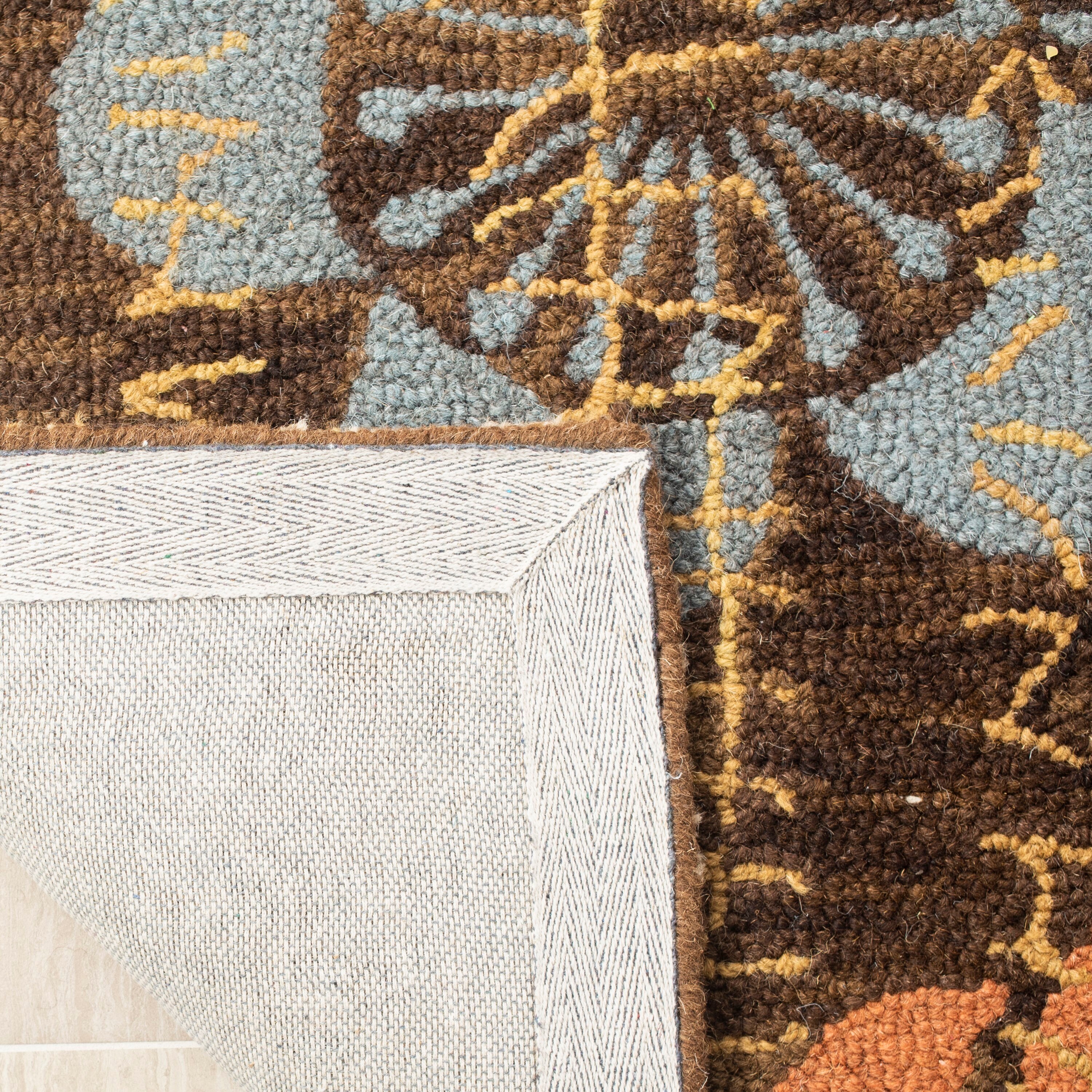 Handmade Tufted Blue and Brown Wool Floral Rug