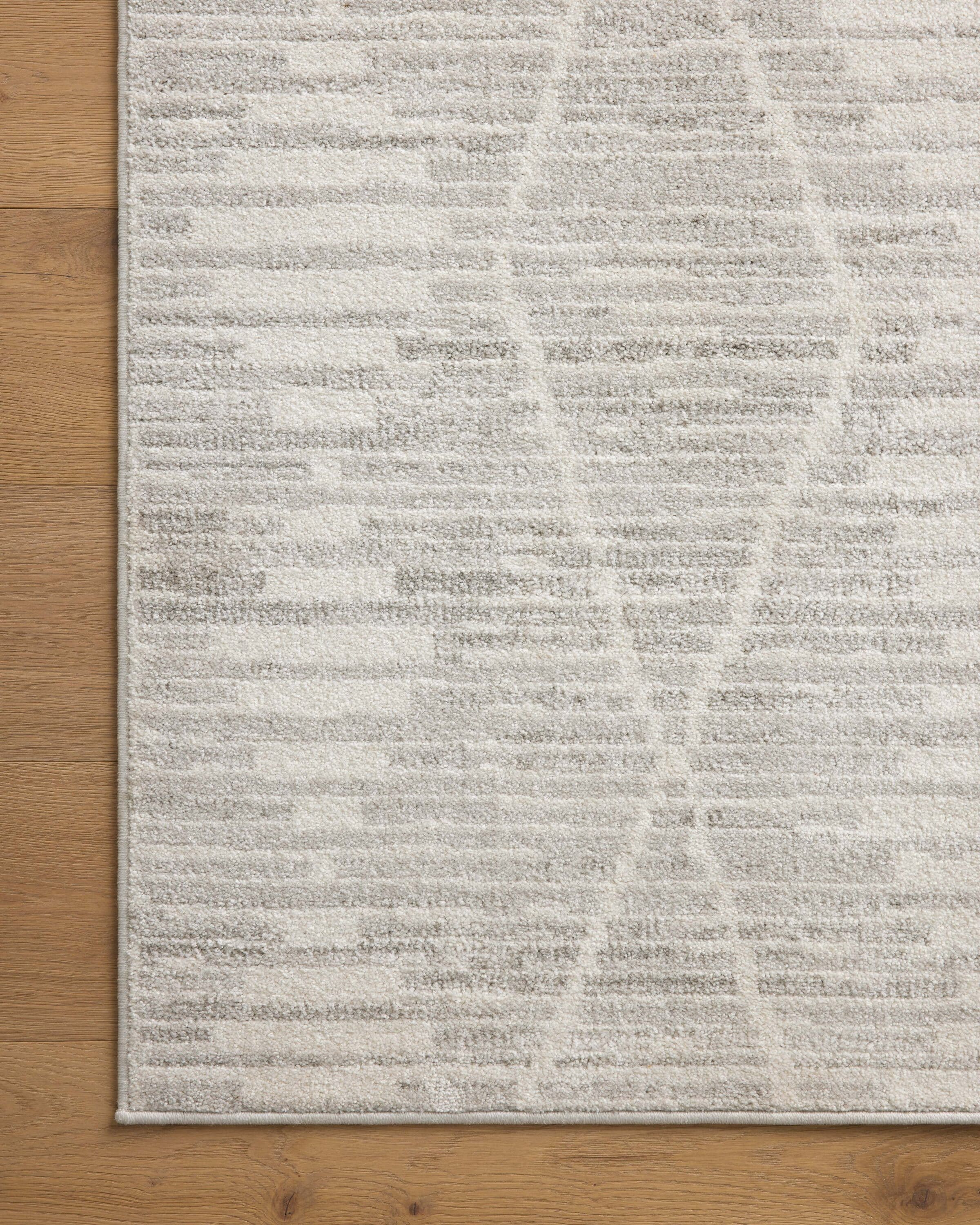 Kamala Ivory and Silver Rectangular Synthetic Area Rug 6'-7" x 9'-6"