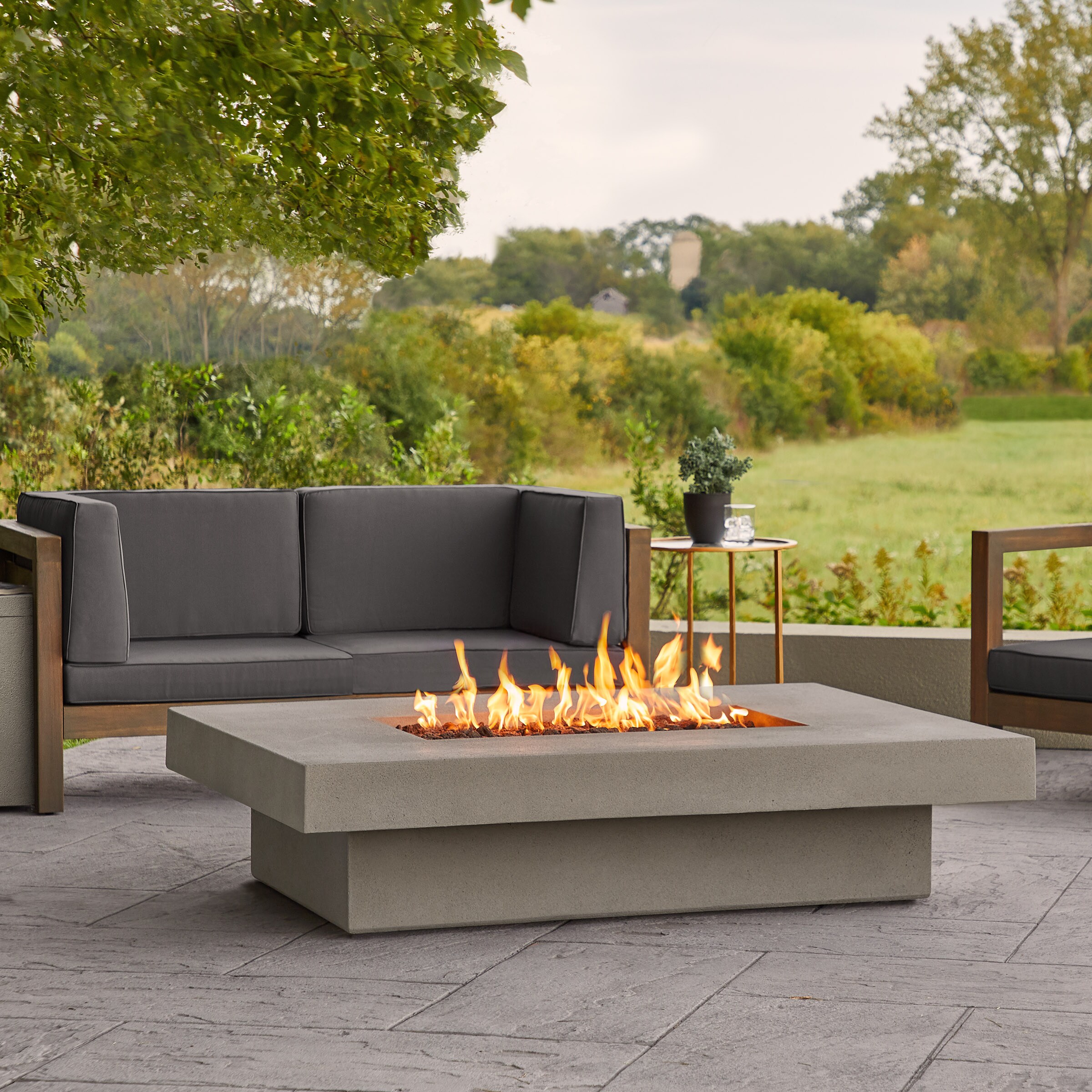 Real Flame 65000 -BTU Carbon Composite Liquid propane Outdoor Fireplace #1581LP-FLNT