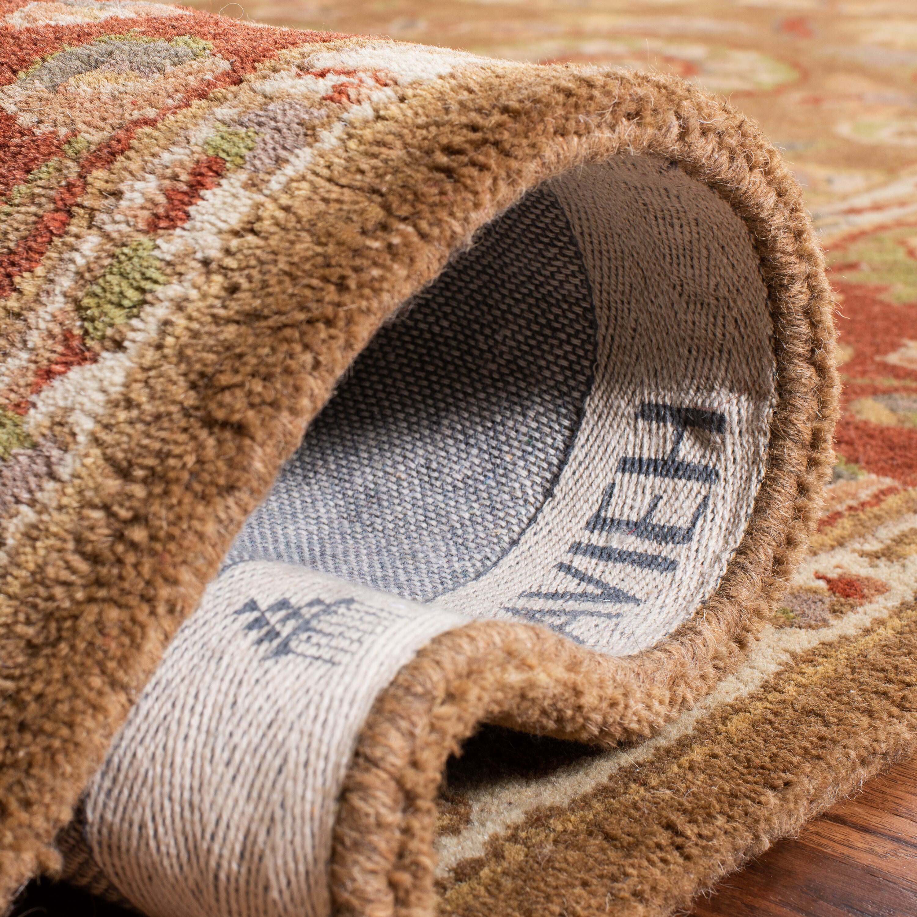 Handmade Ivory Round Wool Tufted Reversible Area Rug