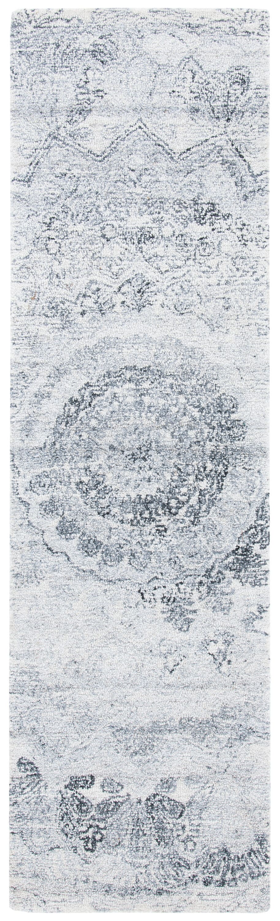 Elegant Abstract Black and Ivory Tufted Wool Rug - 27"x8"