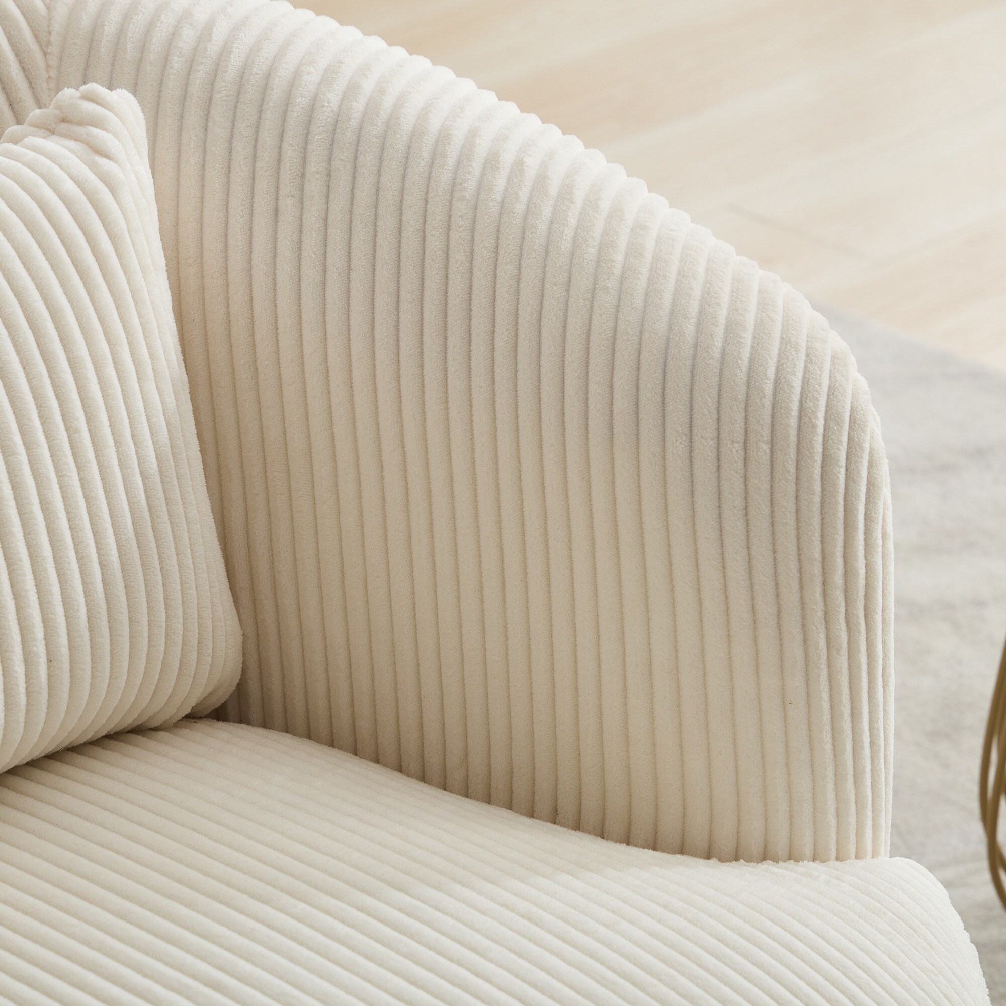 Close-up of the chair’s arm and back upholstery