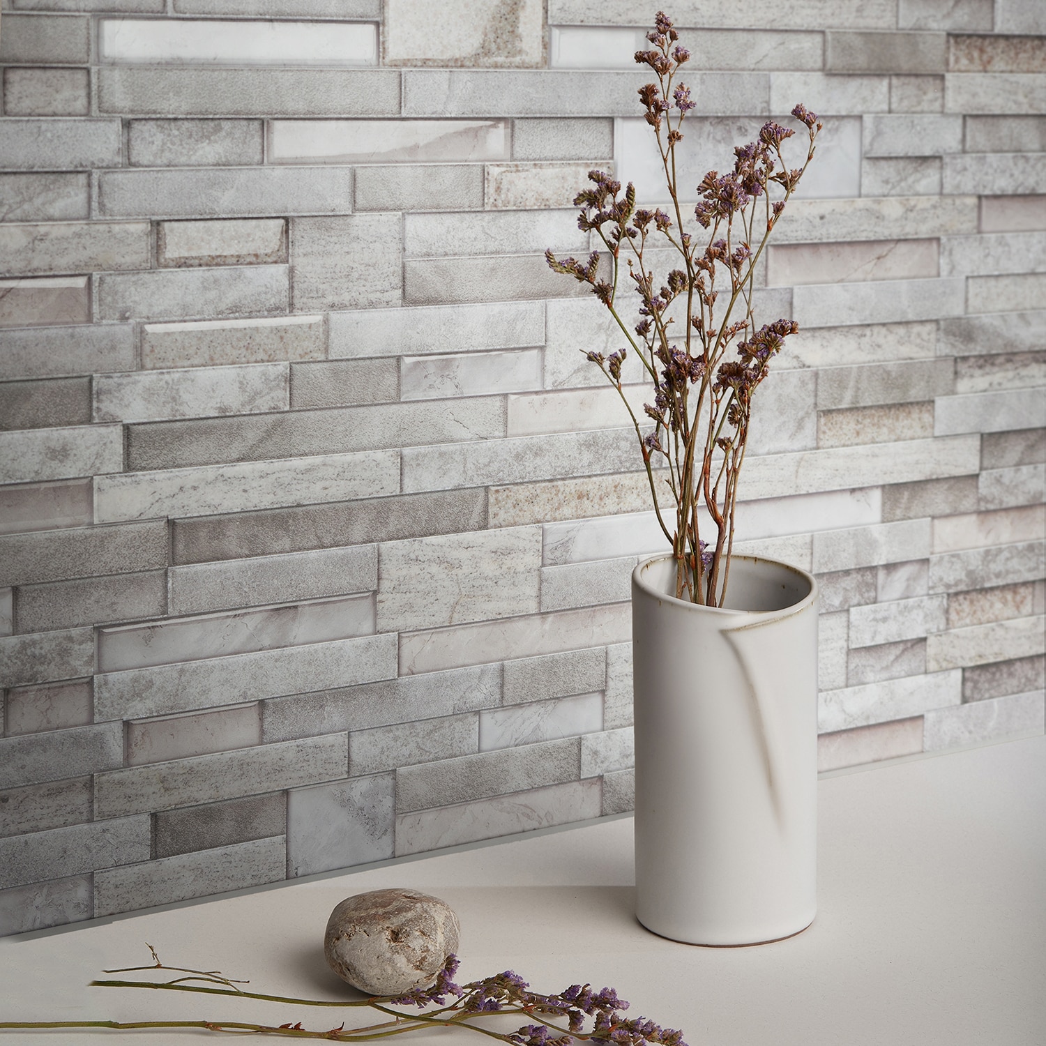 Smart Tiles Pietra Pozzuoli Gray Stone 23-in x 11-in Multi-finish Resin  Linear Stone Look Peel and Stick Wall Tile (2.96-sq. ft/ Carton) in the Tile  department at