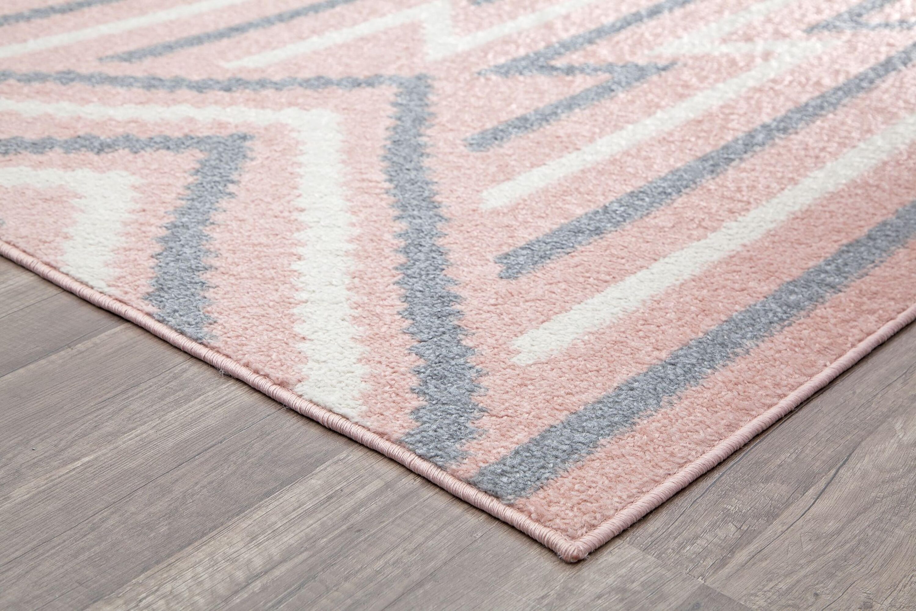 6' x 9' Gray and Pink Geometric Synthetic Area Rug