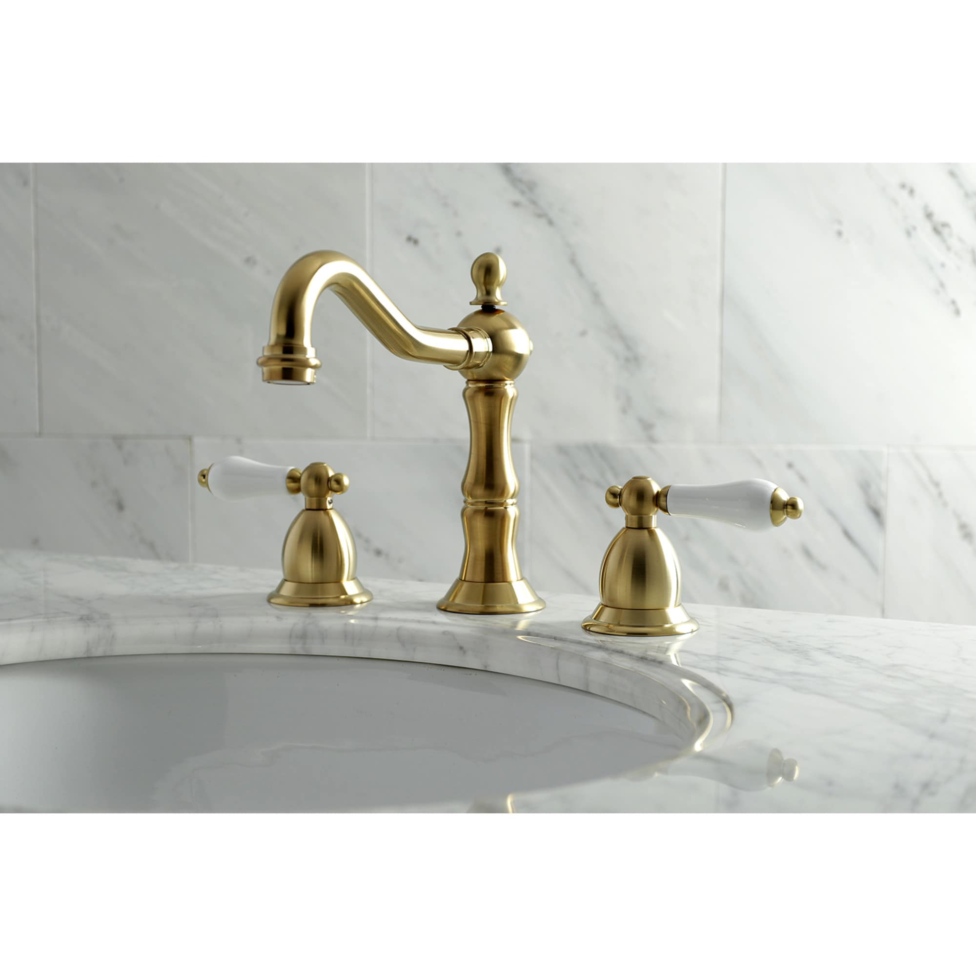 Kingston Brass WLKS1977PL Heritage Brushed brass Widespread 2-handle High-arc Residential Handle Bathroom Sink Faucet with Drain