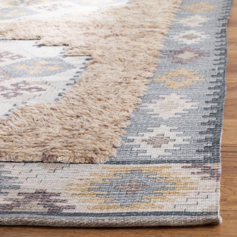 Ivory and Taupe Hand Loomed Wool Area Rug