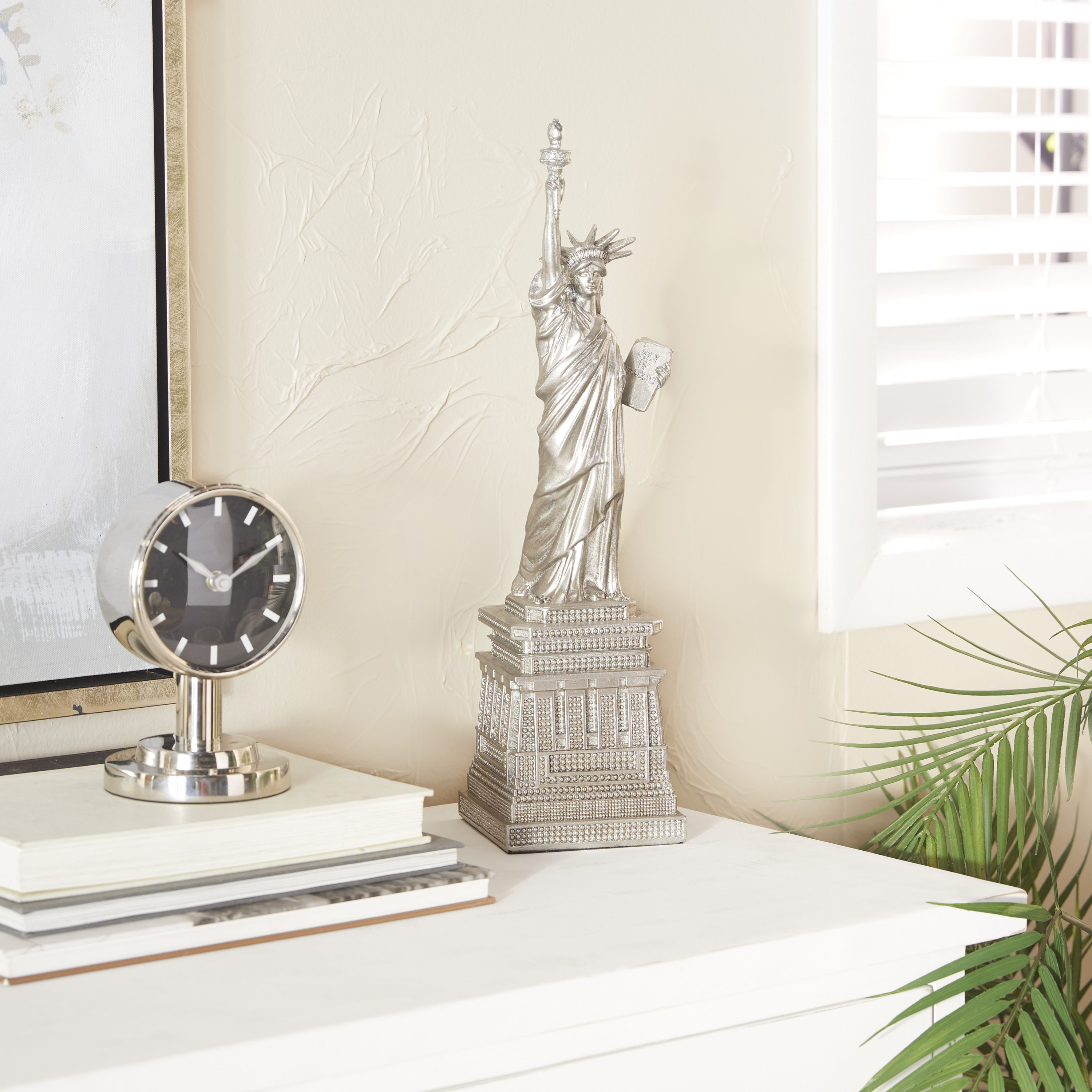 The Novogratz 67585 Silver Resin/Stone Rustic Sculpture