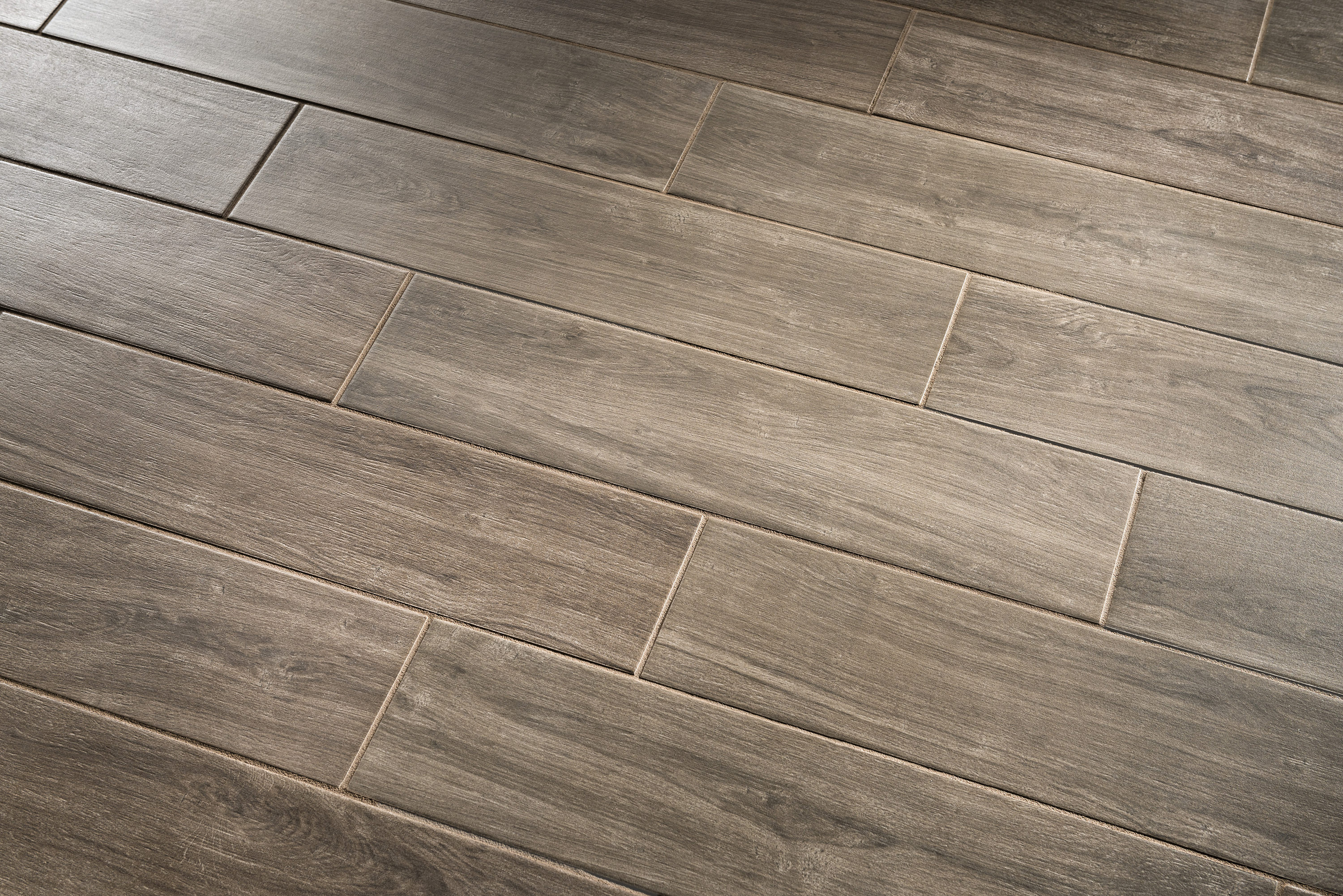 Style Selections Metro Wood Walnut 6 in x 24 in Glazed Porcelain