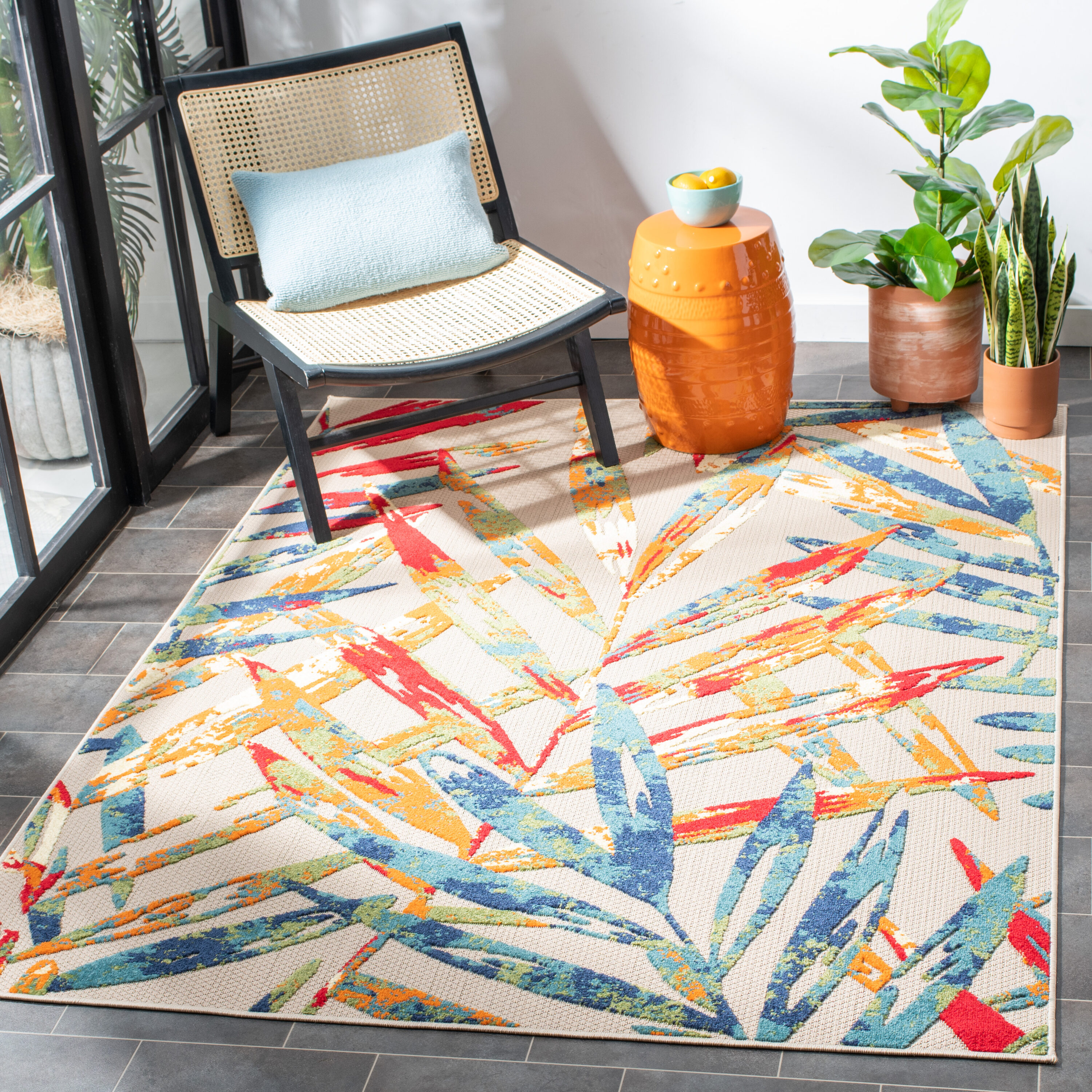 Ivory and Navy Geometric Synthetic Indoor/Outdoor Area Rug
