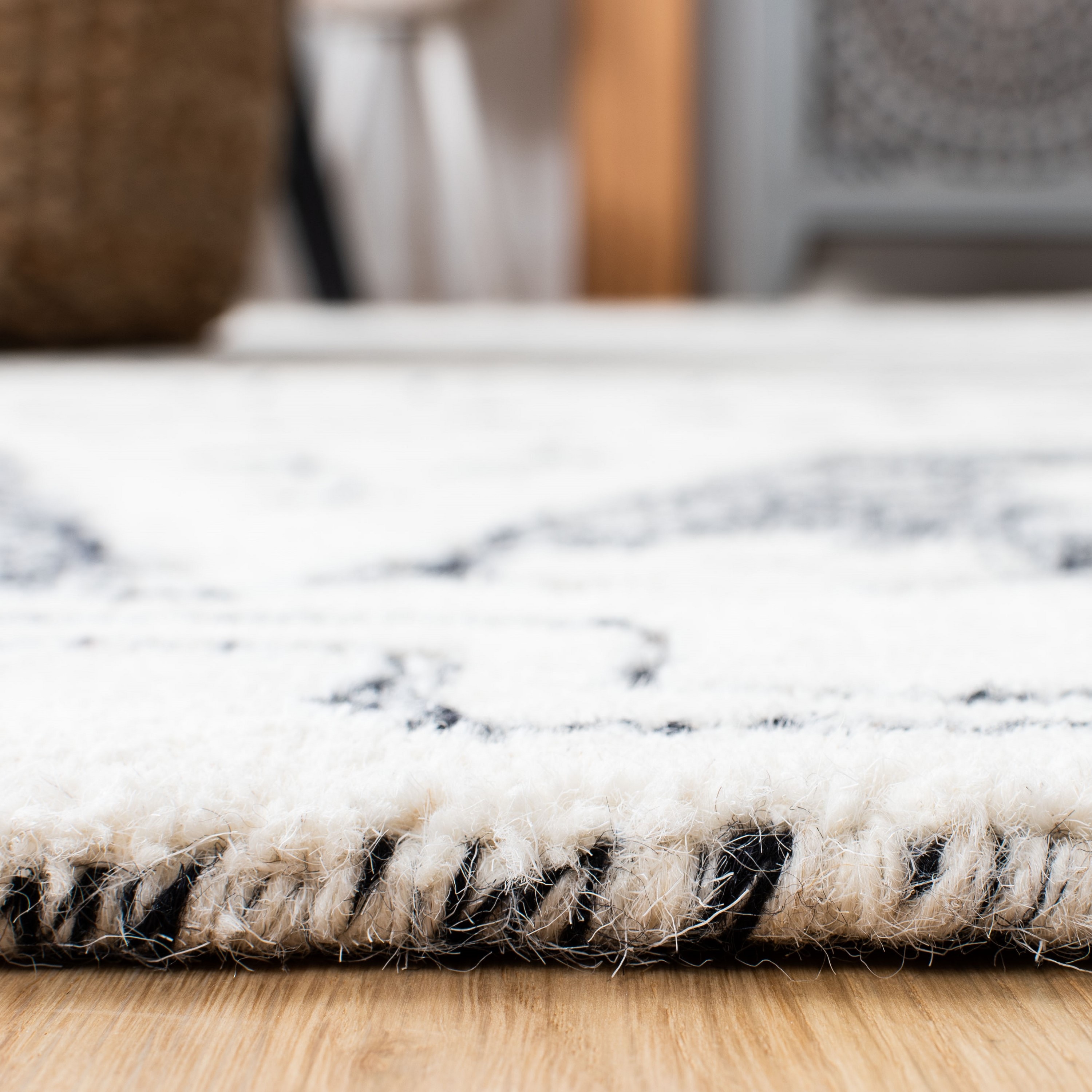 Handmade Black and Ivory Wool Abstract 9' x 12' Rug