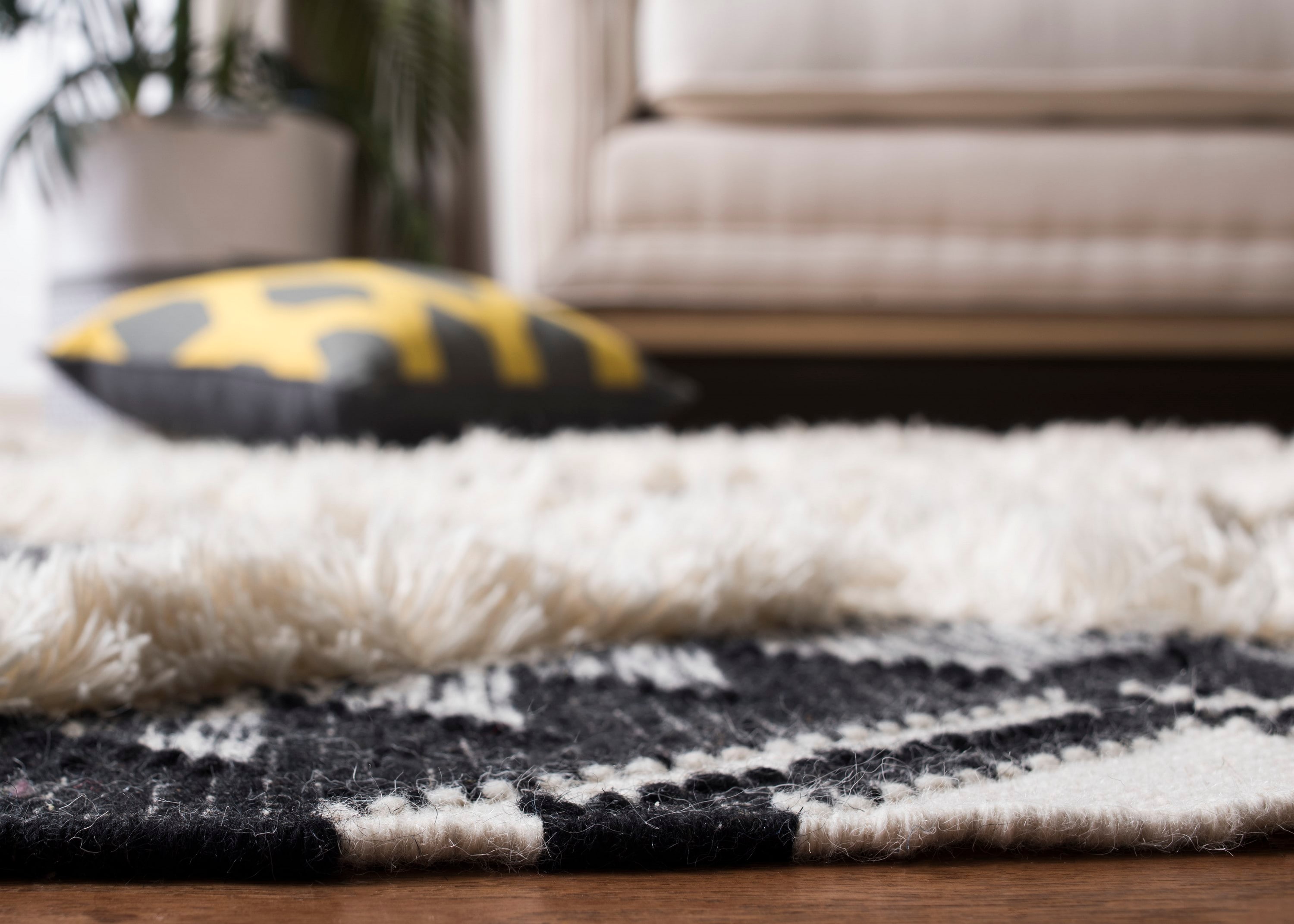 Handwoven Black and Ivory Wool Tribal Area Rug 6' x 9'
