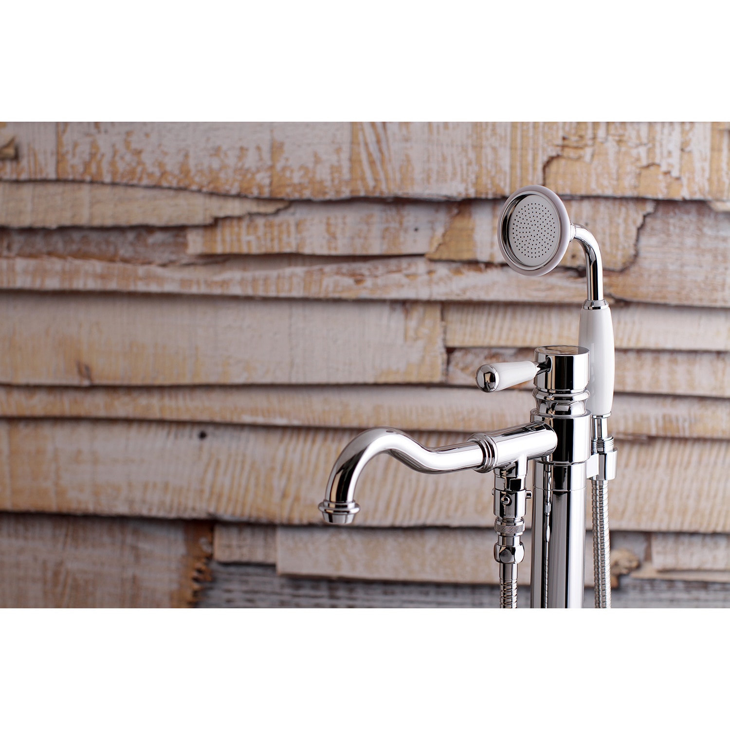 Kingston Brass WLKS7131DPL Paris Polished chrome 1-handle Freestanding Low-arc Bathtub Faucet with Hand Shower ( Valve Included )