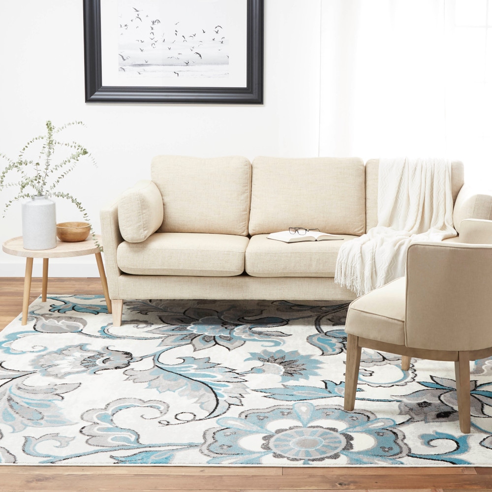 Ivory Floral Tufted 64" Synthetic Easy-Care Area Rug