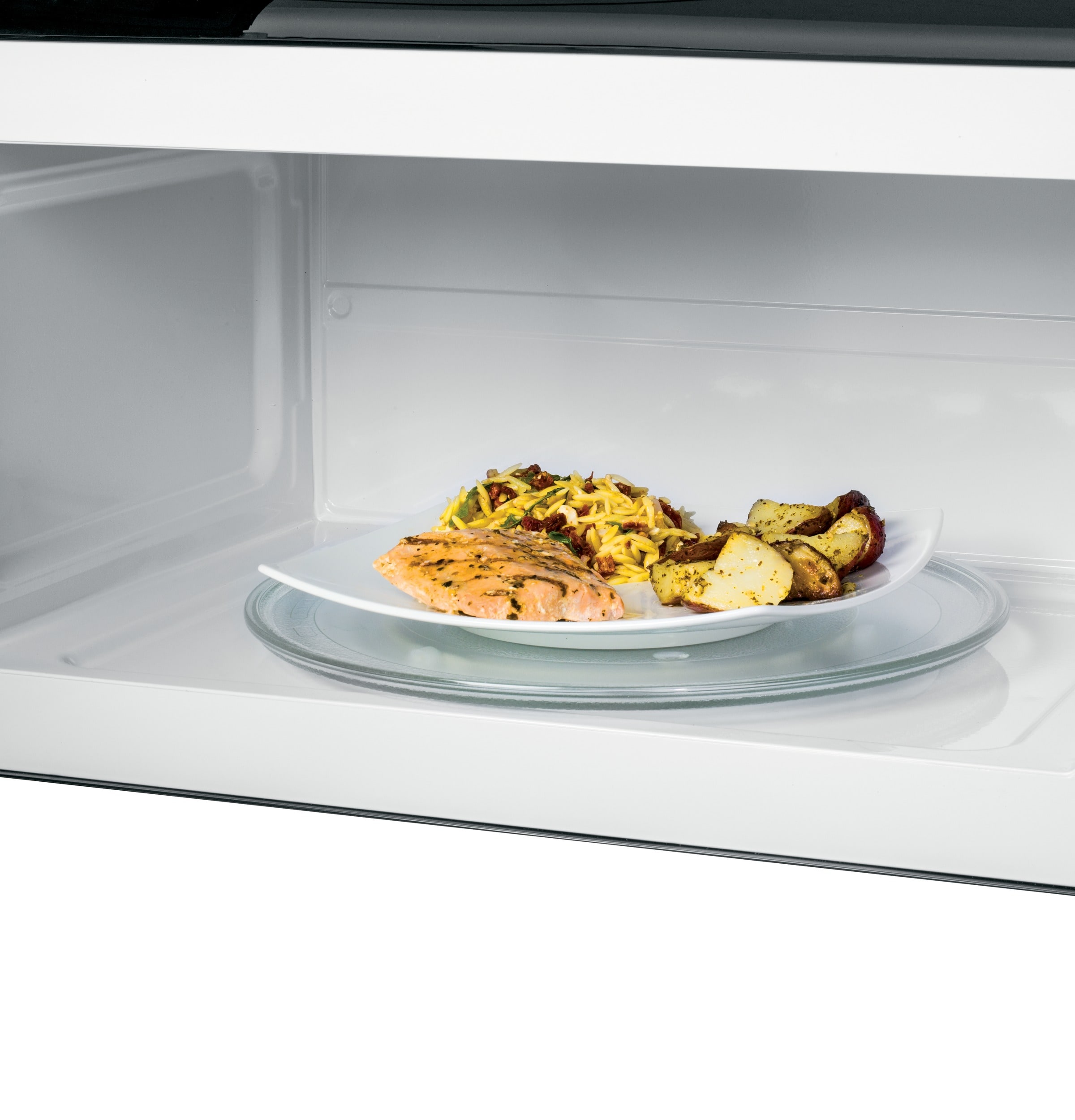 JEM3072DHWWGE GE® 0.7 Cu. Ft. Spacemaker® Countertop Microwave Oven WHITE -  Westco Home Furnishings