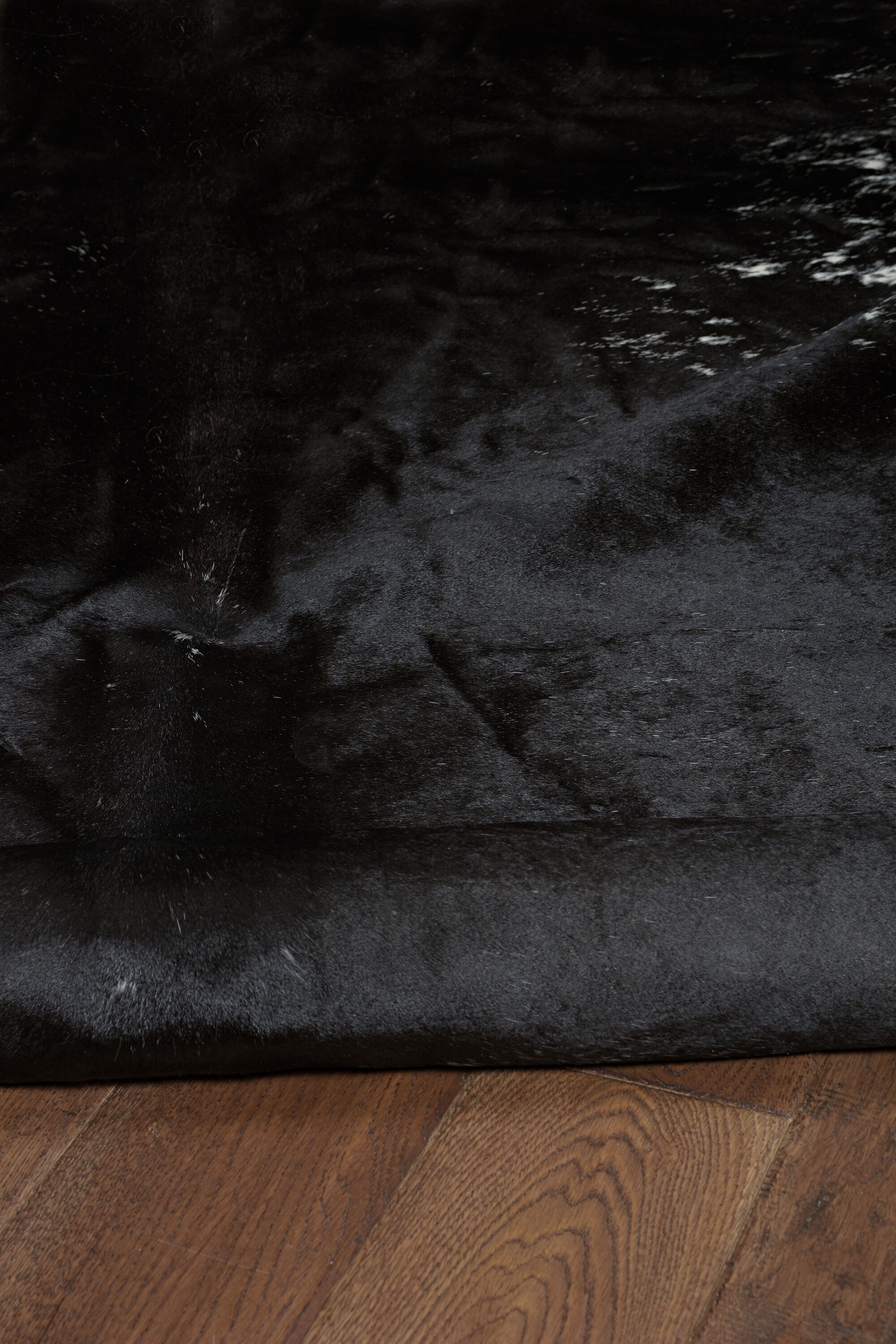 Handmade Black and Dark Brown Cowhide Rug