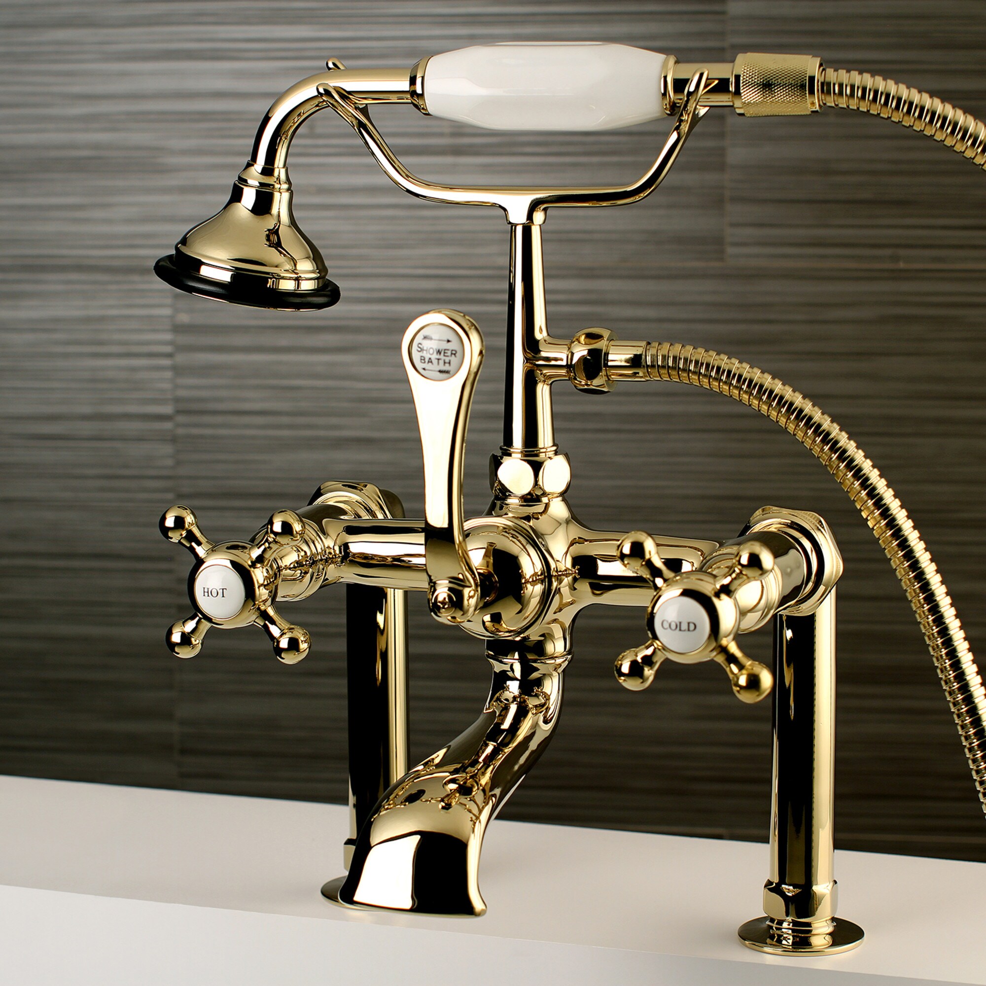 Kingston Brass WLAE103T2BX English Country Polished brass 3-handle Deck-mount Roman Low-arc Bathtub Faucet with Hand Shower ( Valve Included )