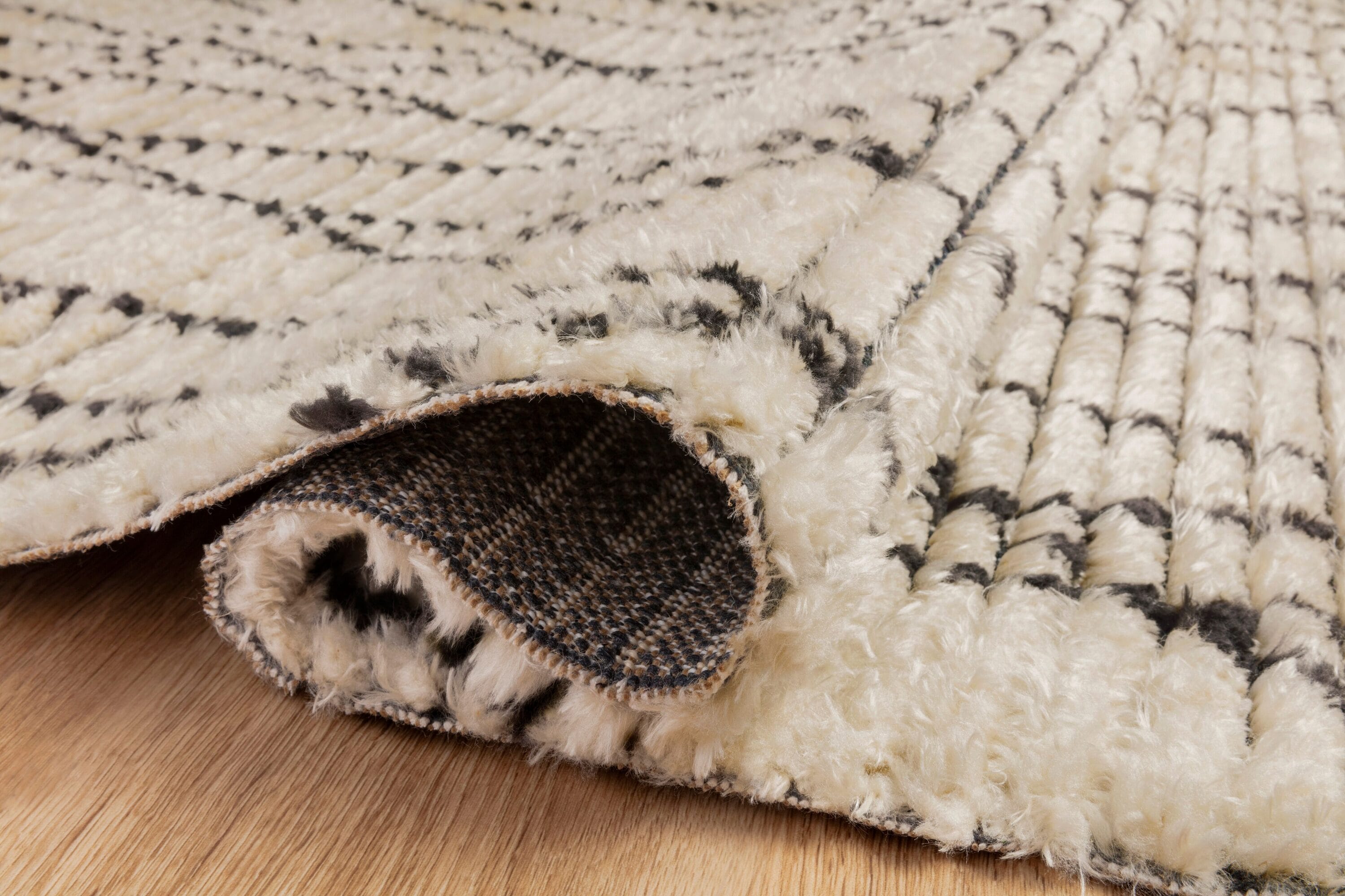 Ivory and Charcoal Abstract Synthetic Reversible Rug 31" x 120"