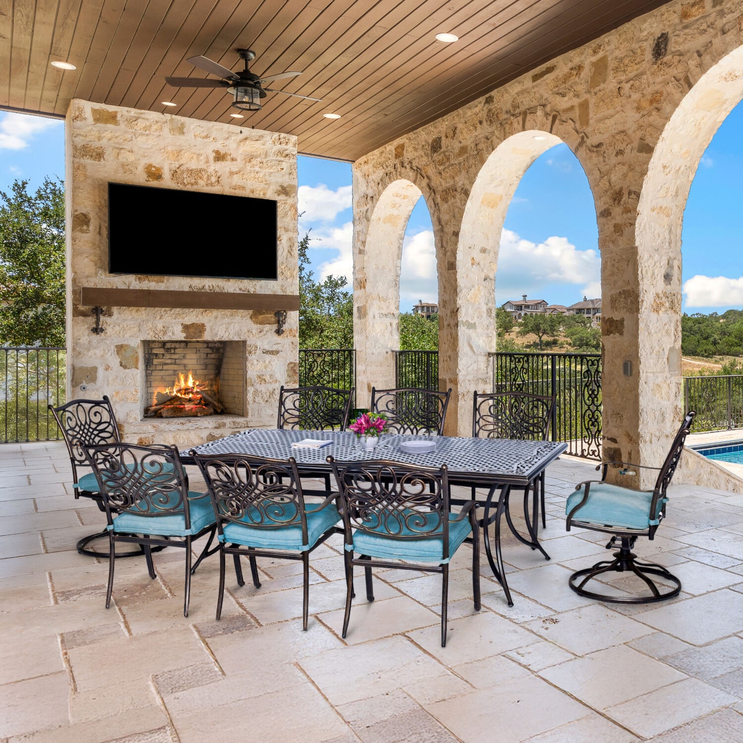 Hanover TRAD9PCSW2-BLU Traditions 9 -Piece Bronze Patio Dining Set Aluminum Rectangle Table with 8 Blue Cushions Stationary and Motion Chairs