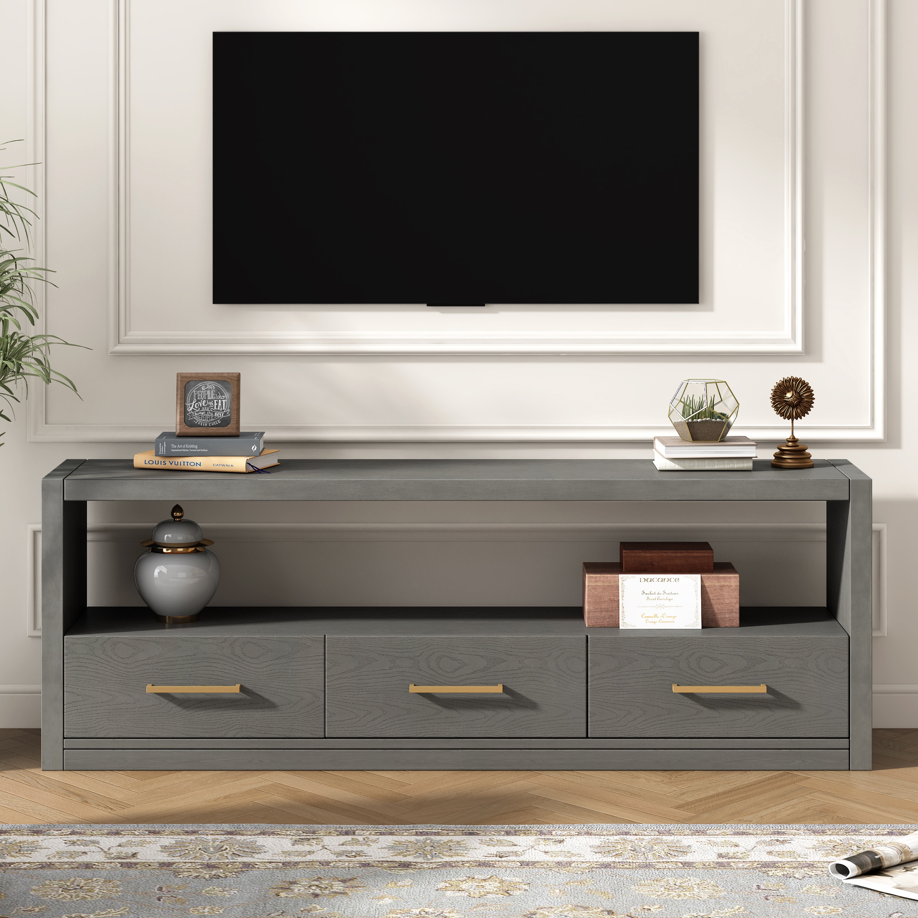 ModernLuxe N760P251944E Mirod Stylish TV Stand with Ample StorageClassic Design with Three Drawers and Spacious SurfaceMinimalist Metal HandlesVersatile as TV Console or Side Cabinet