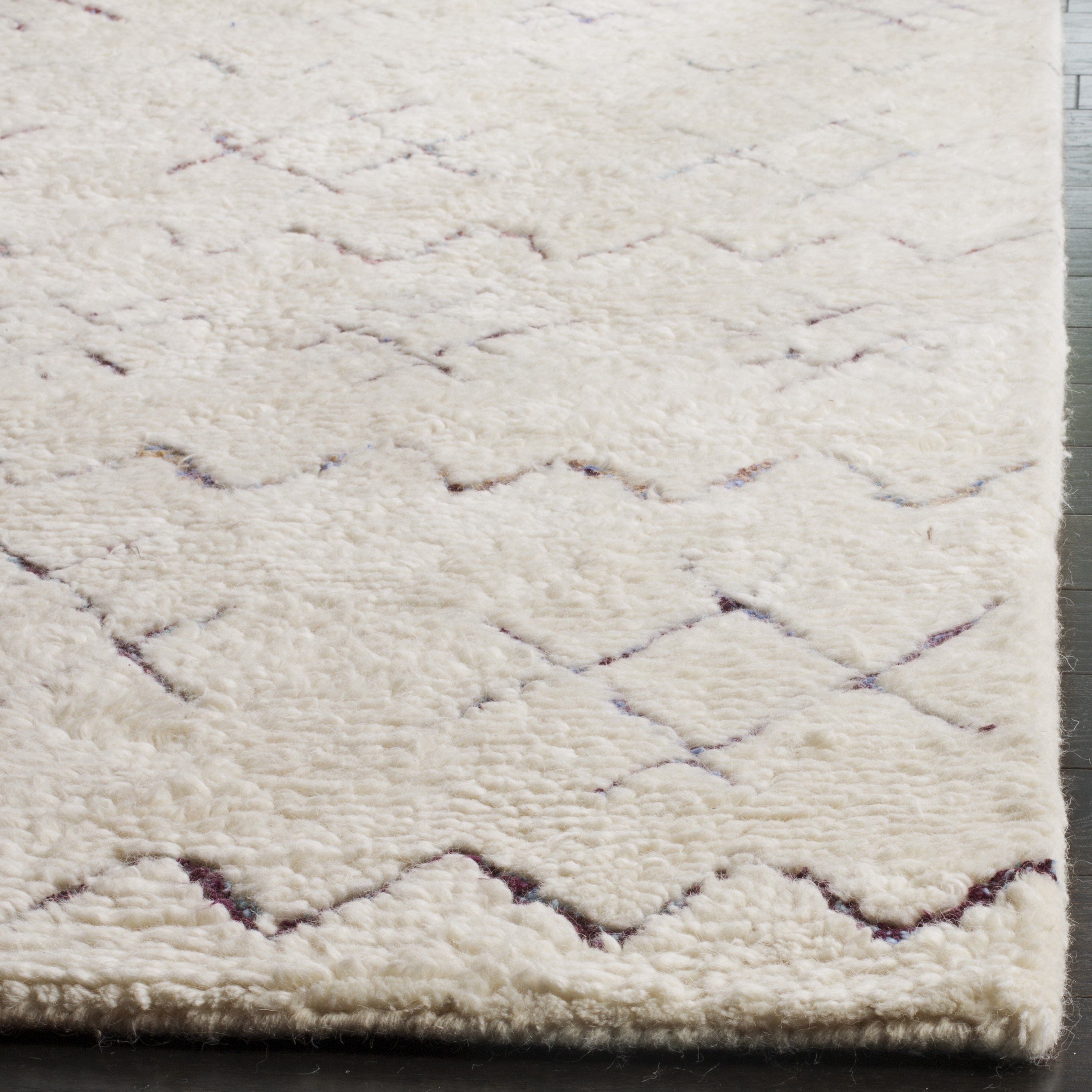 Ivory Hand-Tufted Wool Shag Area Rug 6' x 9'