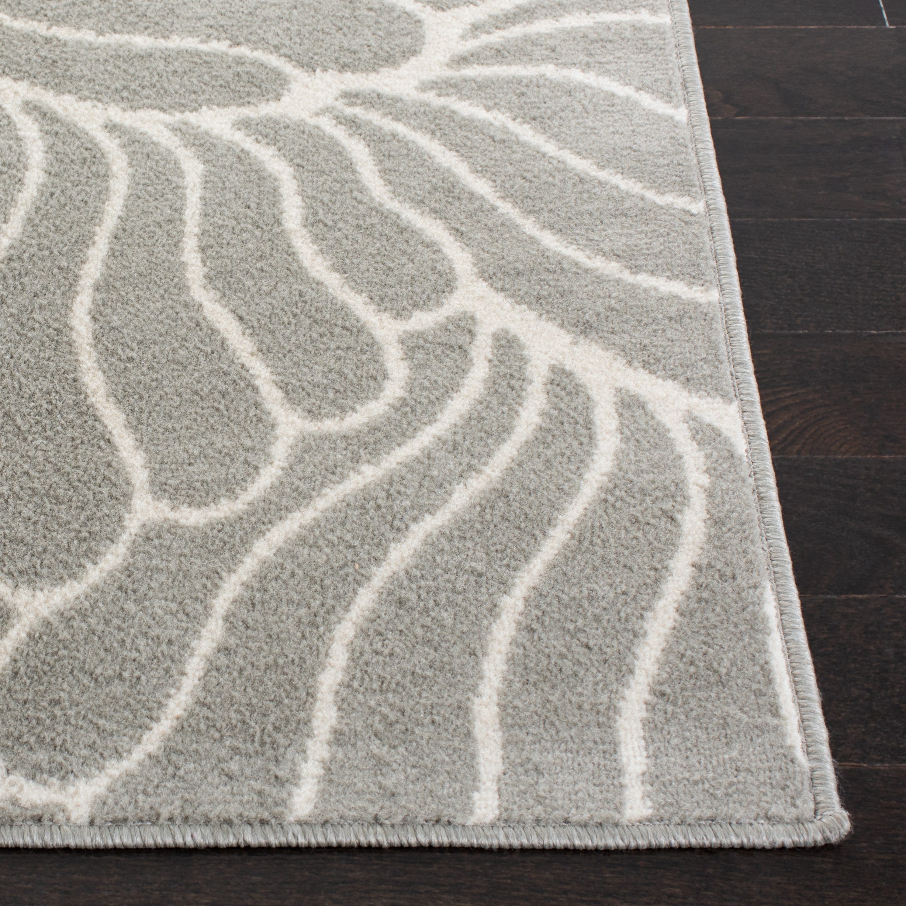 Gray and Ivory Abstract Synthetic 4' x 6' Area Rug