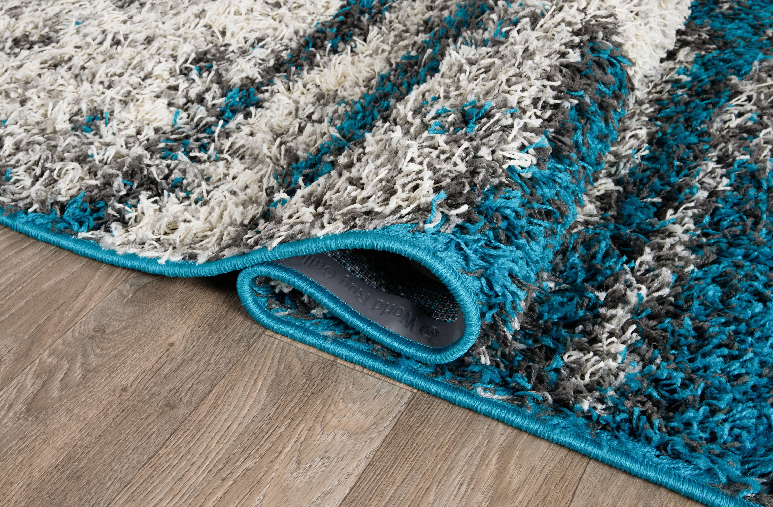 Turquoise and Gray Abstract Shag 8' x 10' Synthetic Rug