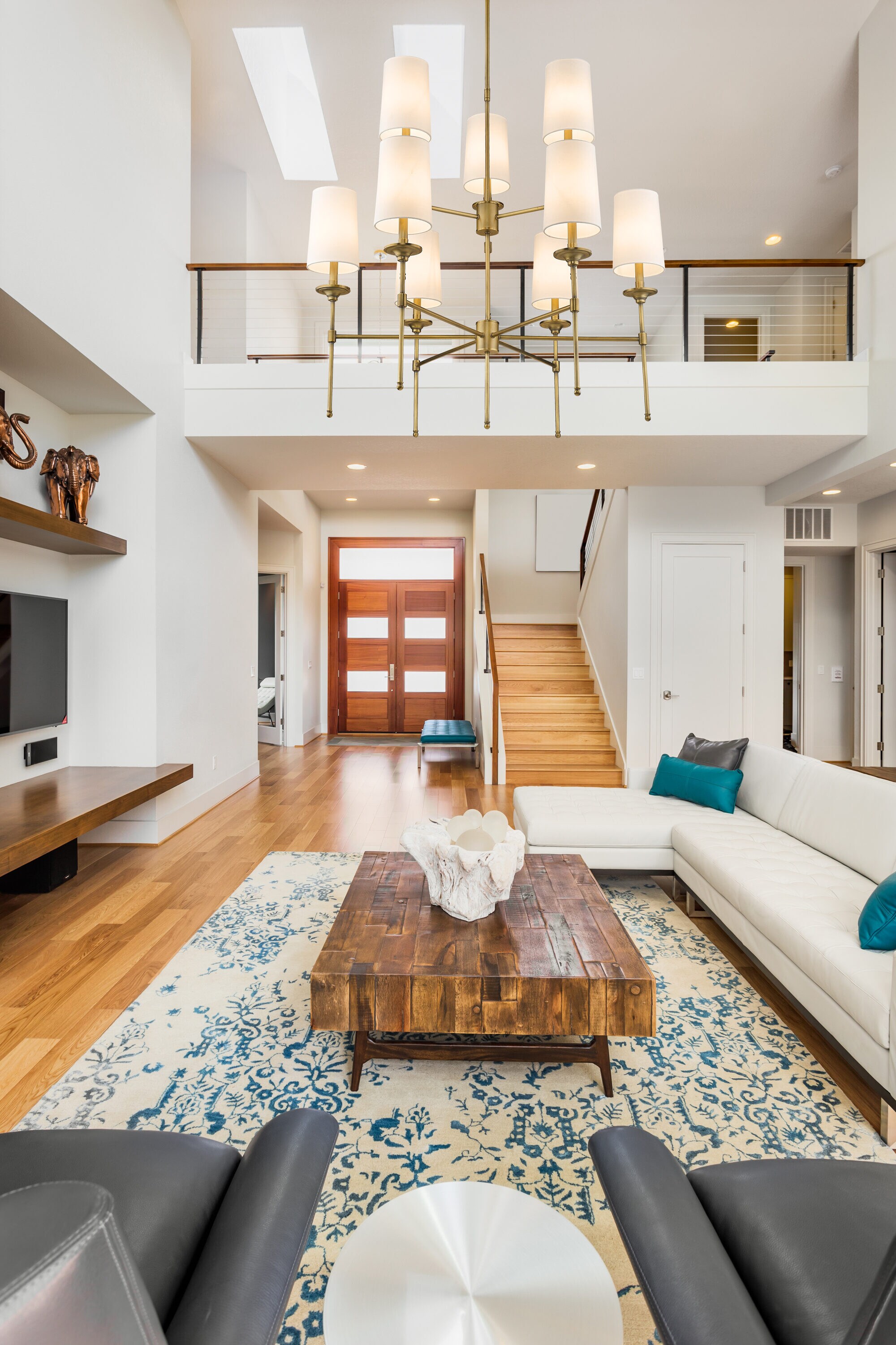 Emily Rubbed Brass 9-Light Chandelier with Off-White Shades