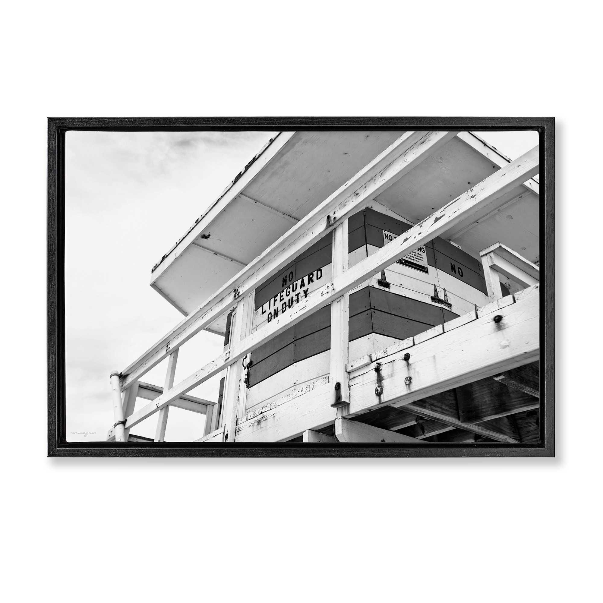 Stupell Industries BT-556-FFB-16X24 Lifeguard Building on Beach Black Framed Floater Canvas Wall Art By Seven Trees Design 25 x 17