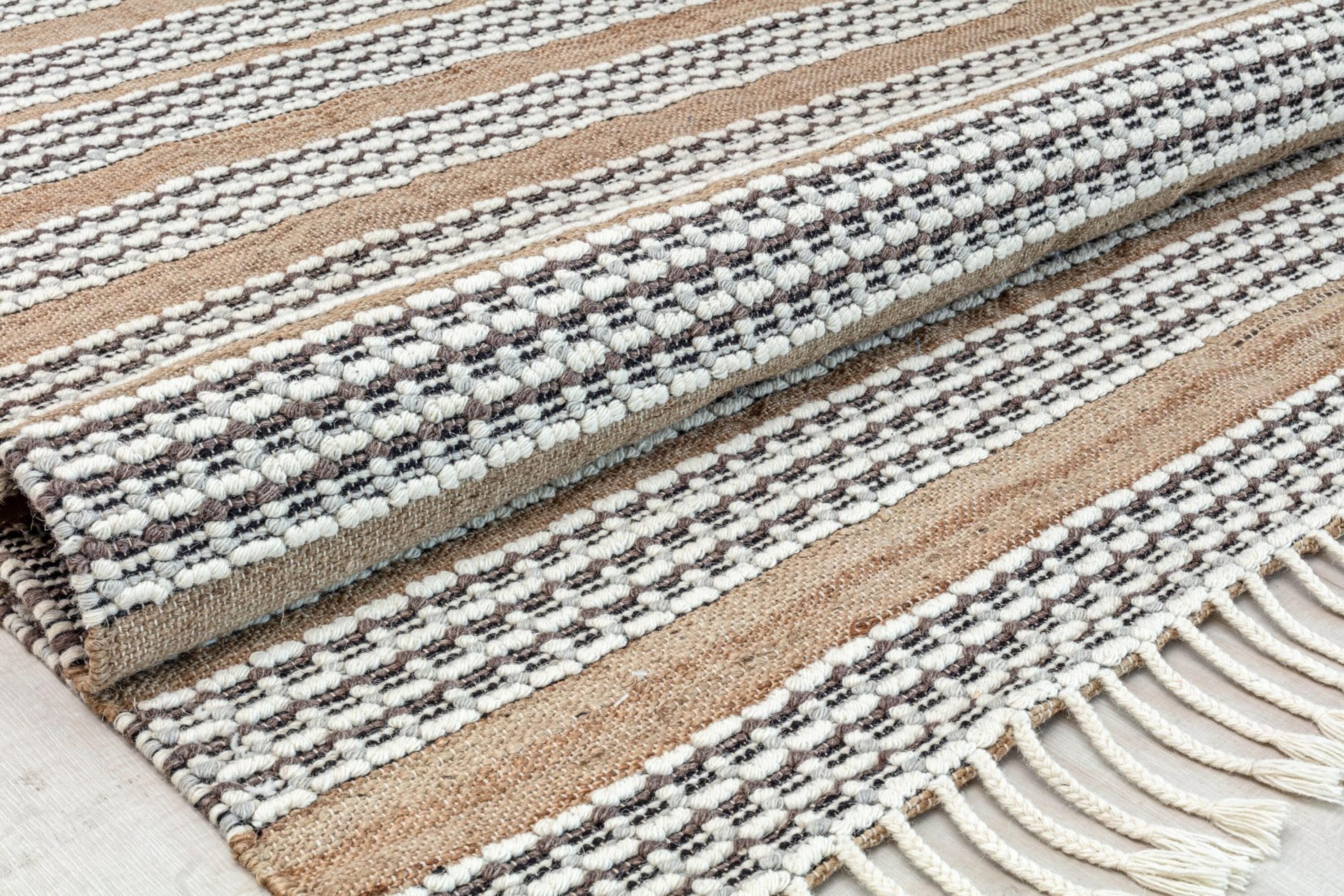 Handmade Natural Jute and Wool Striped Area Rug with Tassels