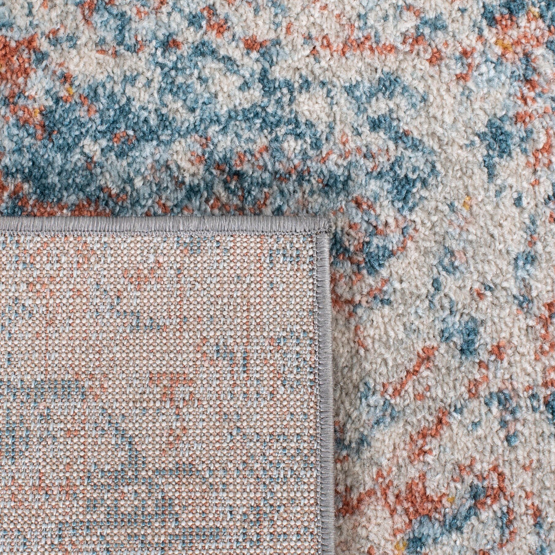 Ivory and Blue Abstract 9' x 12' Stain-Resistant Rug