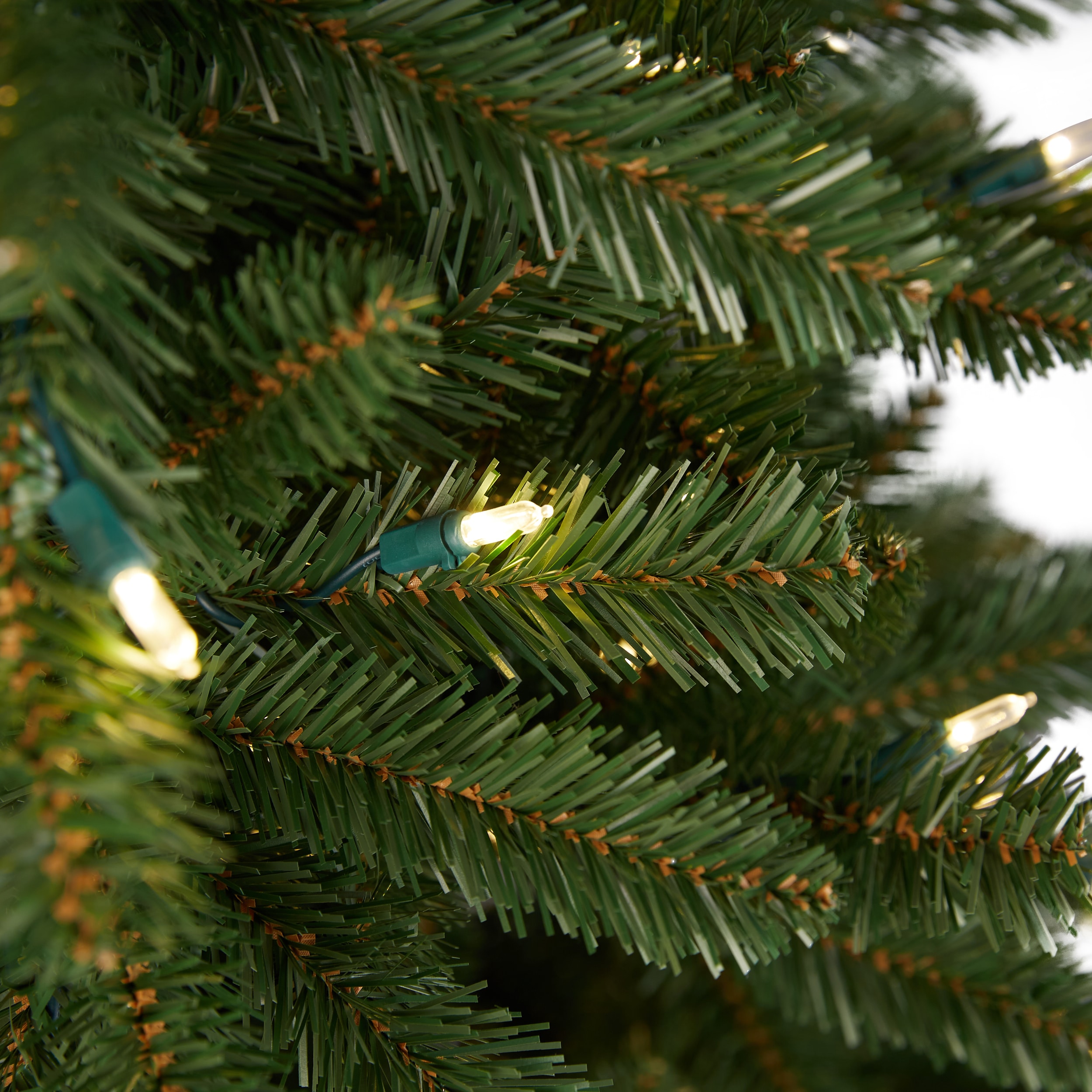 103, Christmas bells on a fir tree branch with pinecones