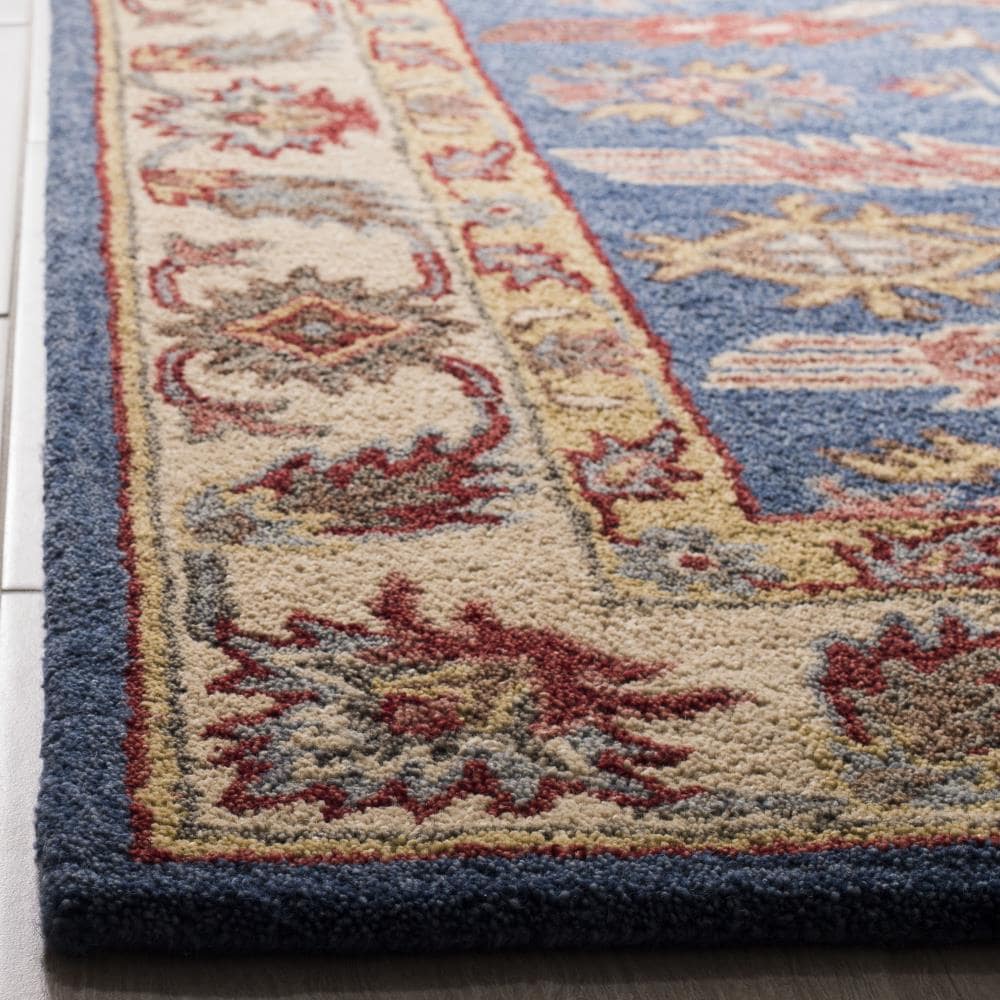 Handmade Blue and Red Wool Tufted 6' x 9' Area Rug