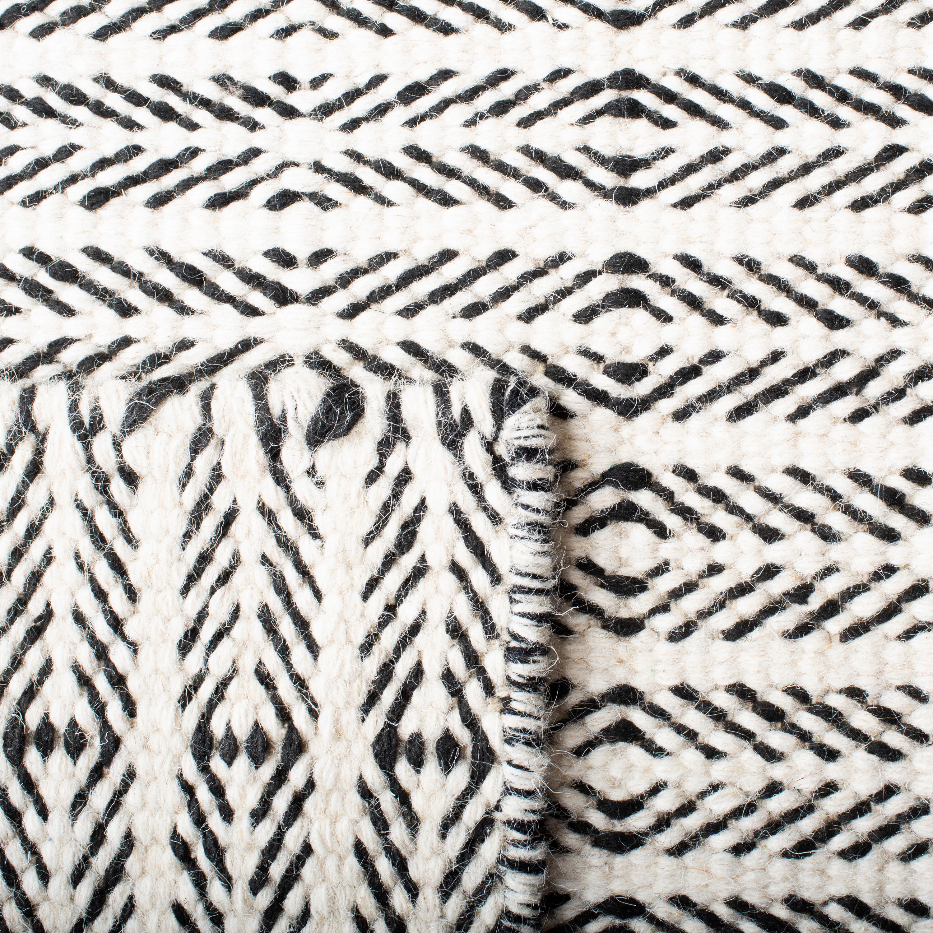 Handmade Black and Ivory Wool Tufted Reversible Area Rug, 9' x 12'