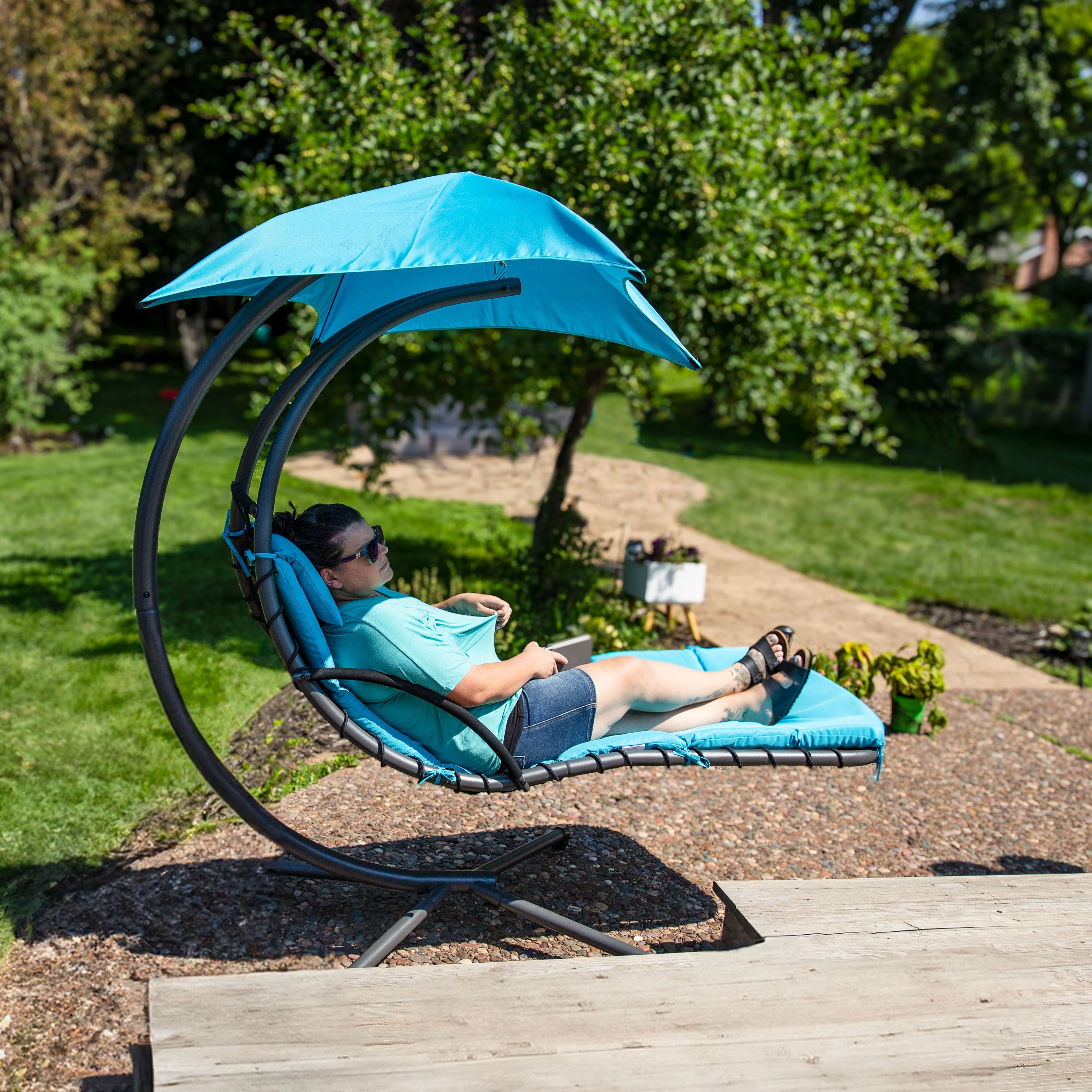 Teal Floating Chaise Lounge Chair with Canopy and Cushions