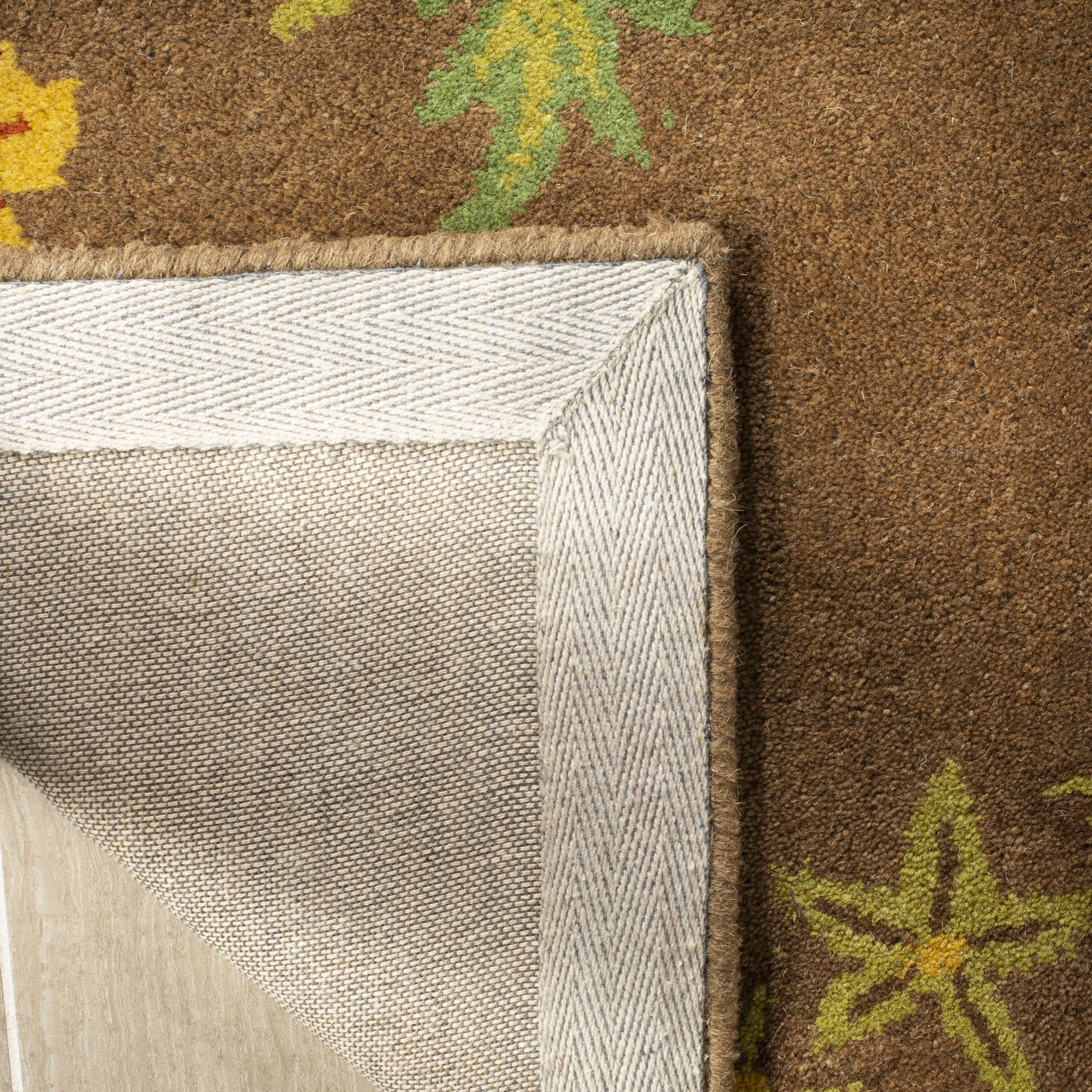 Handmade Tufted Floral Brown Wool Area Rug