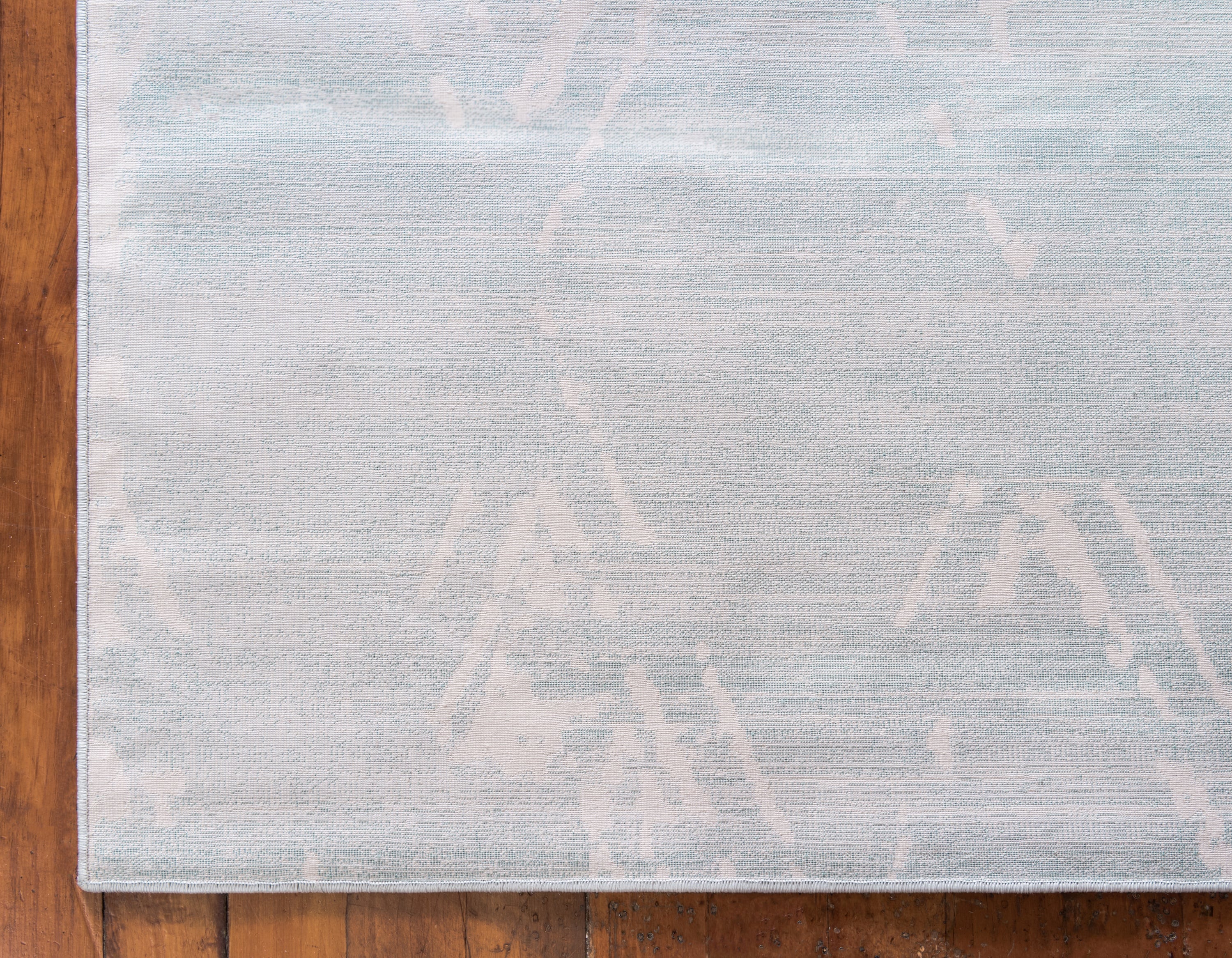 Turquoise and Ivory Rectangular Synthetic Indoor Rug, 5' x 8'