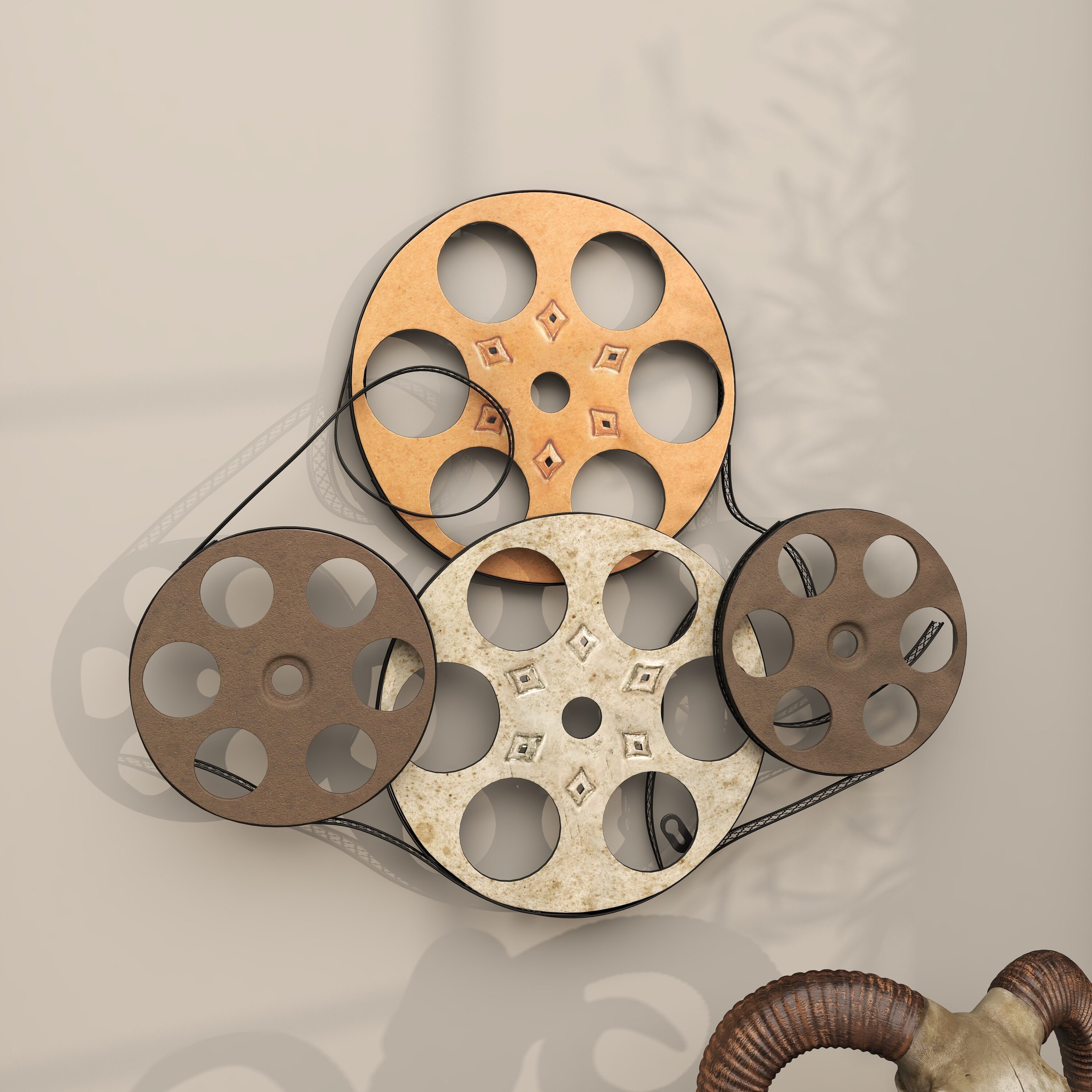 Grayson Lane 25-in W x 22-in H Metal Film Reels Abstract Wall Sculpture at