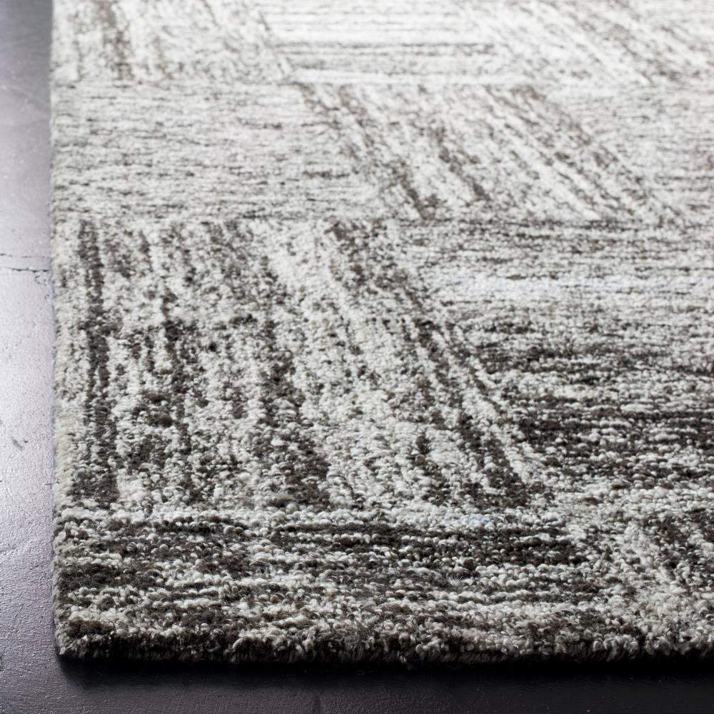 Ivory and Charcoal Abstract Tufted Wool 4' x 6' Rug