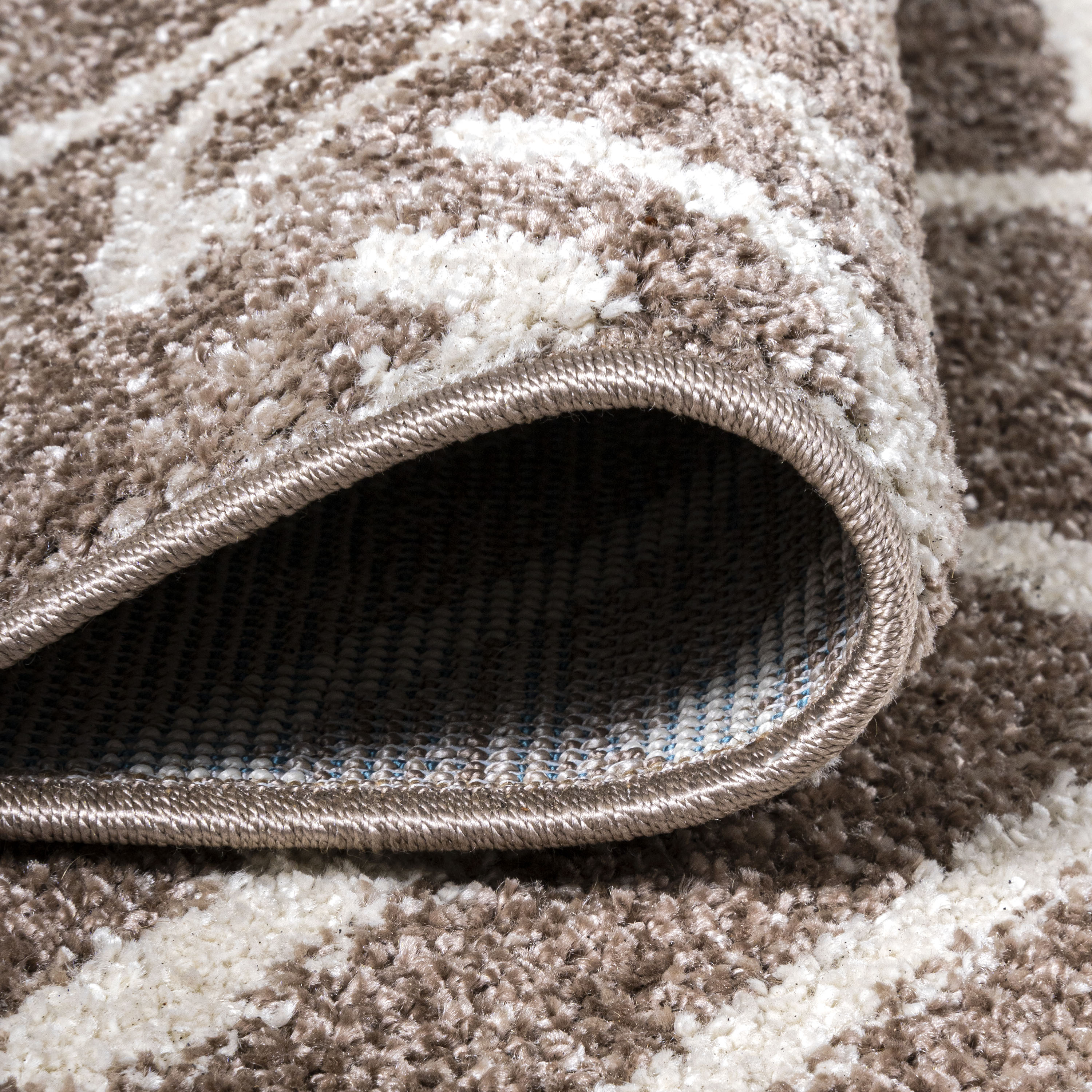 Ivory and Brown Geometric Synthetic 4' x 6' Reversible Area Rug
