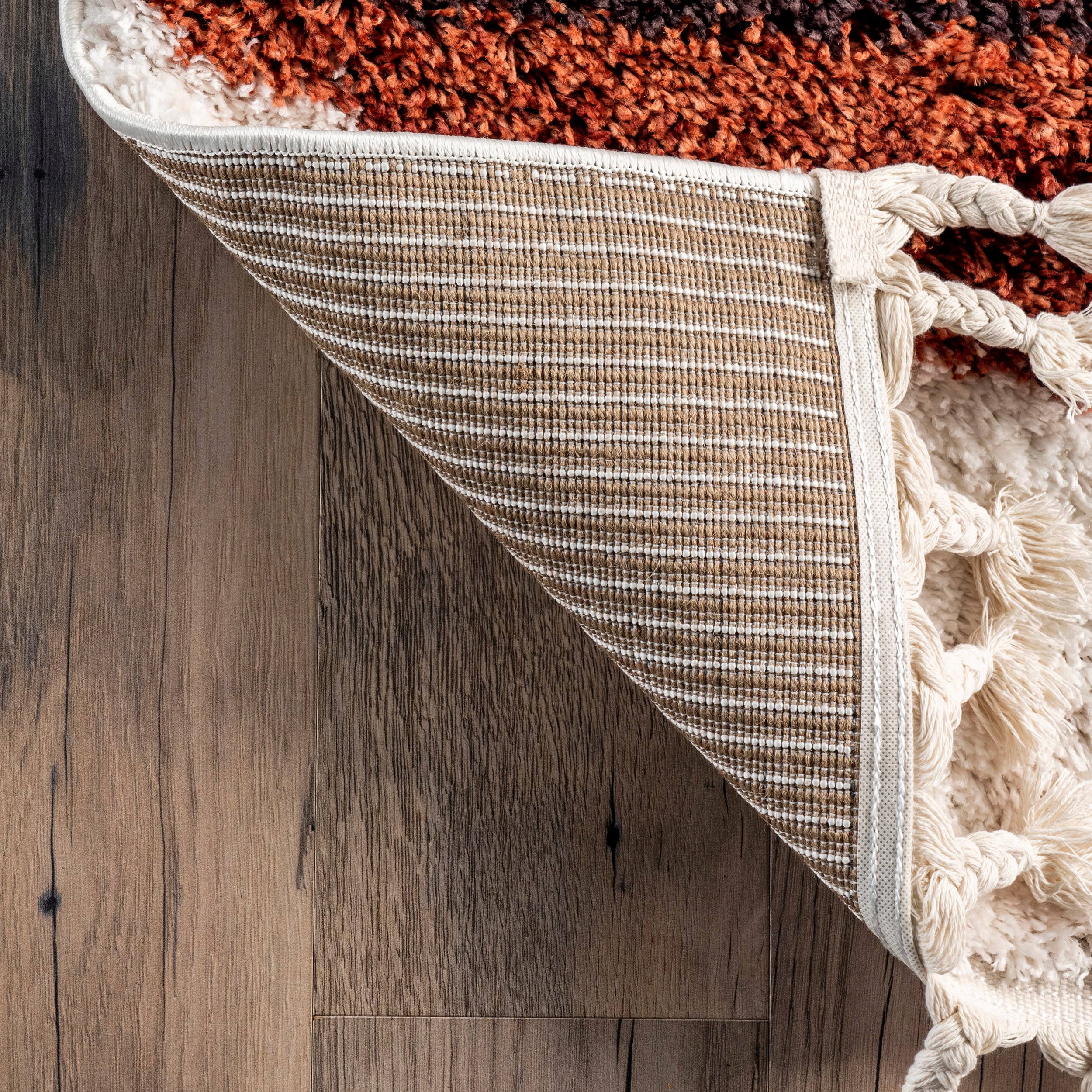 Rust and Ivory Geometric Shag 8' x 10' Synthetic Area Rug