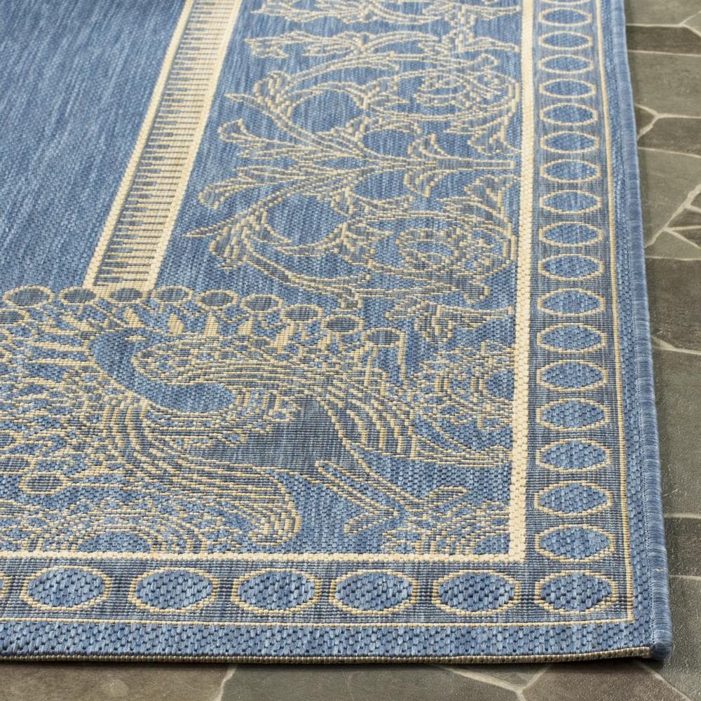 Blue and Natural Synthetic Stain-Resistant Indoor/Outdoor Area Rug